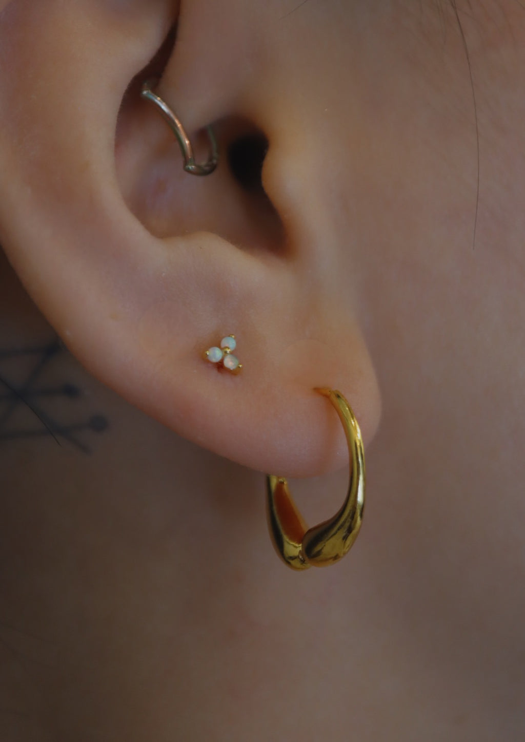 Hinged hoop base metal earrings