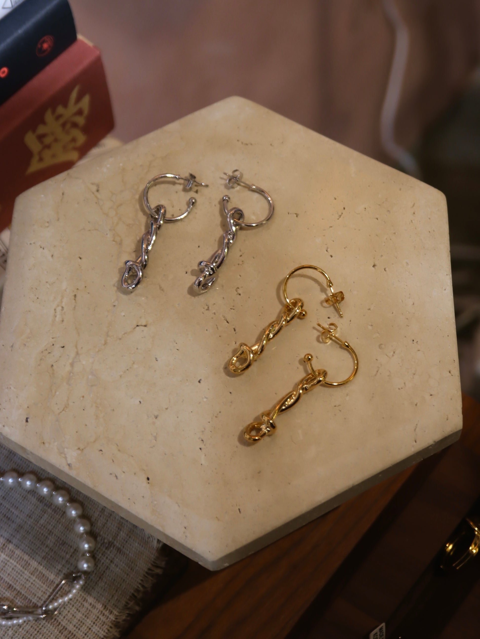 Drop knot twisted earrings