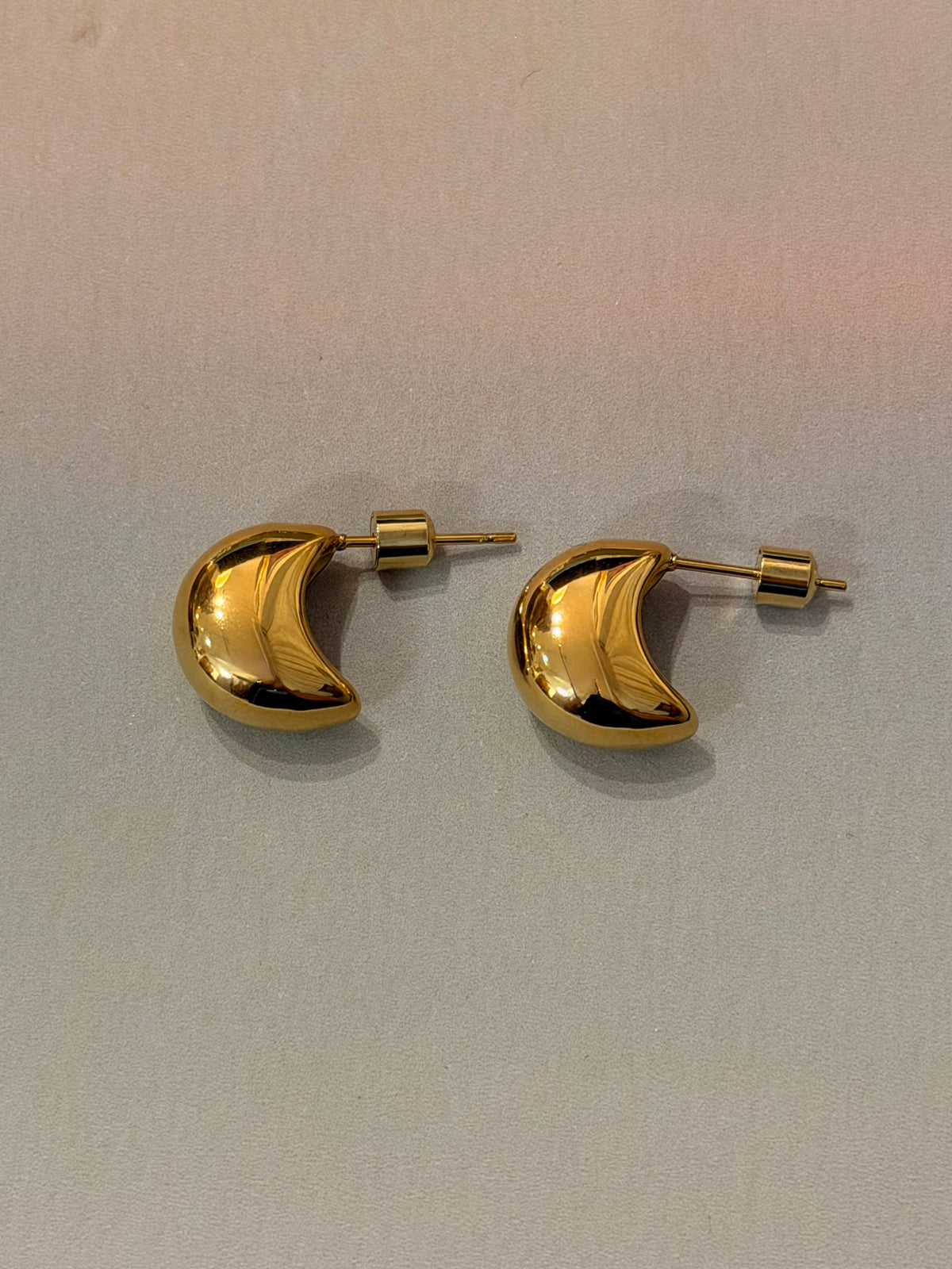 Crescent glow stainless steel earrings