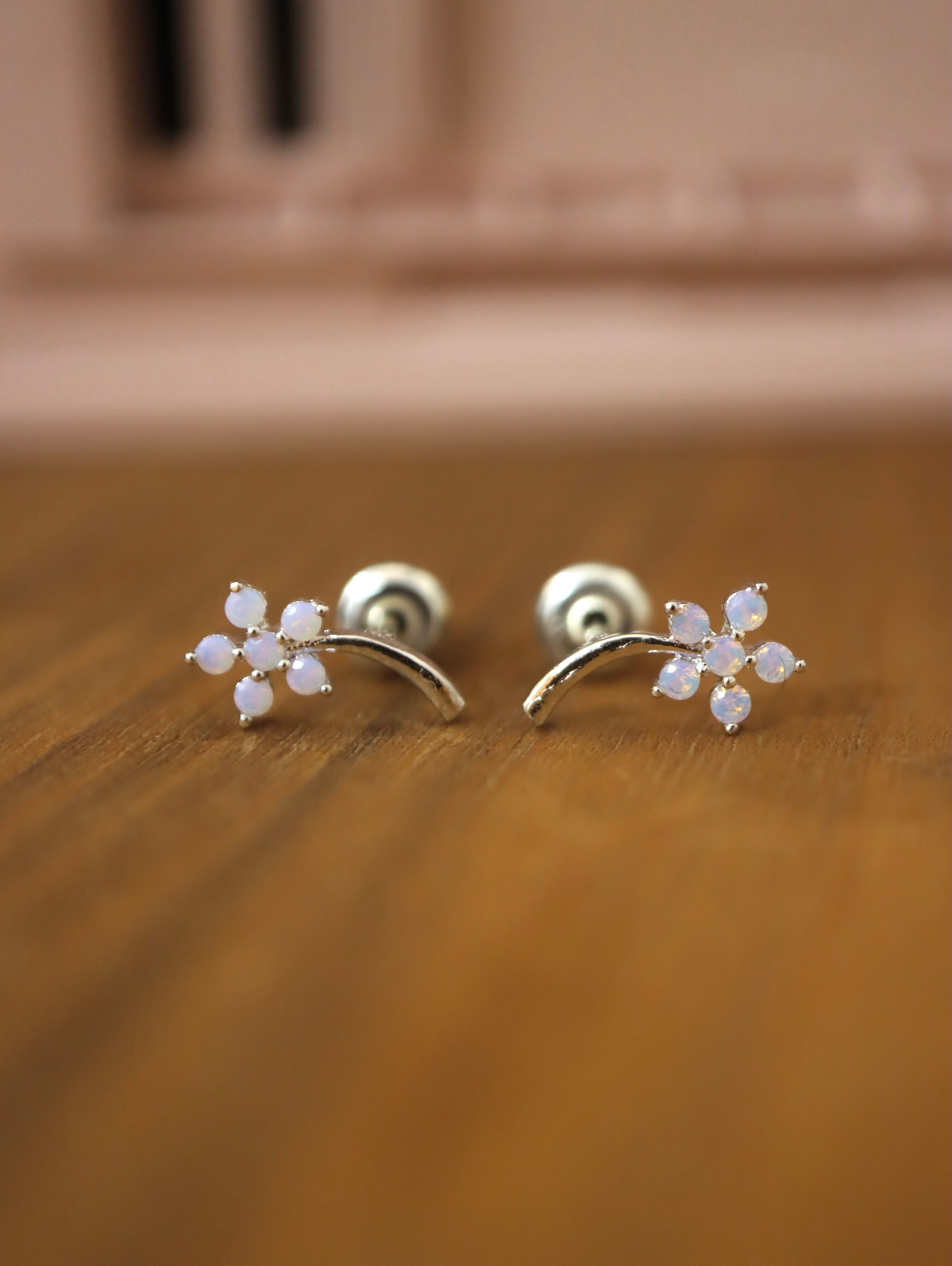 Petal climber brass earrings