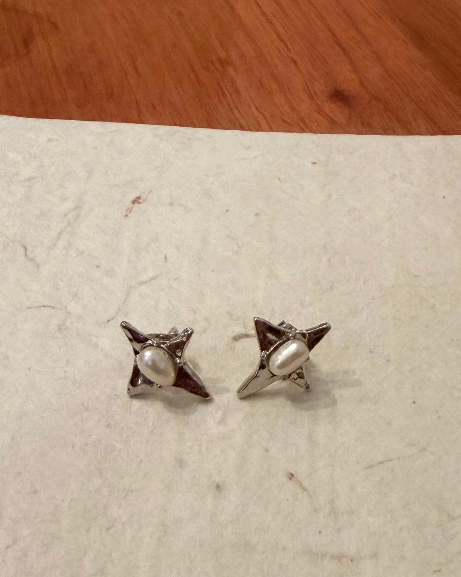 Cross pearl earring