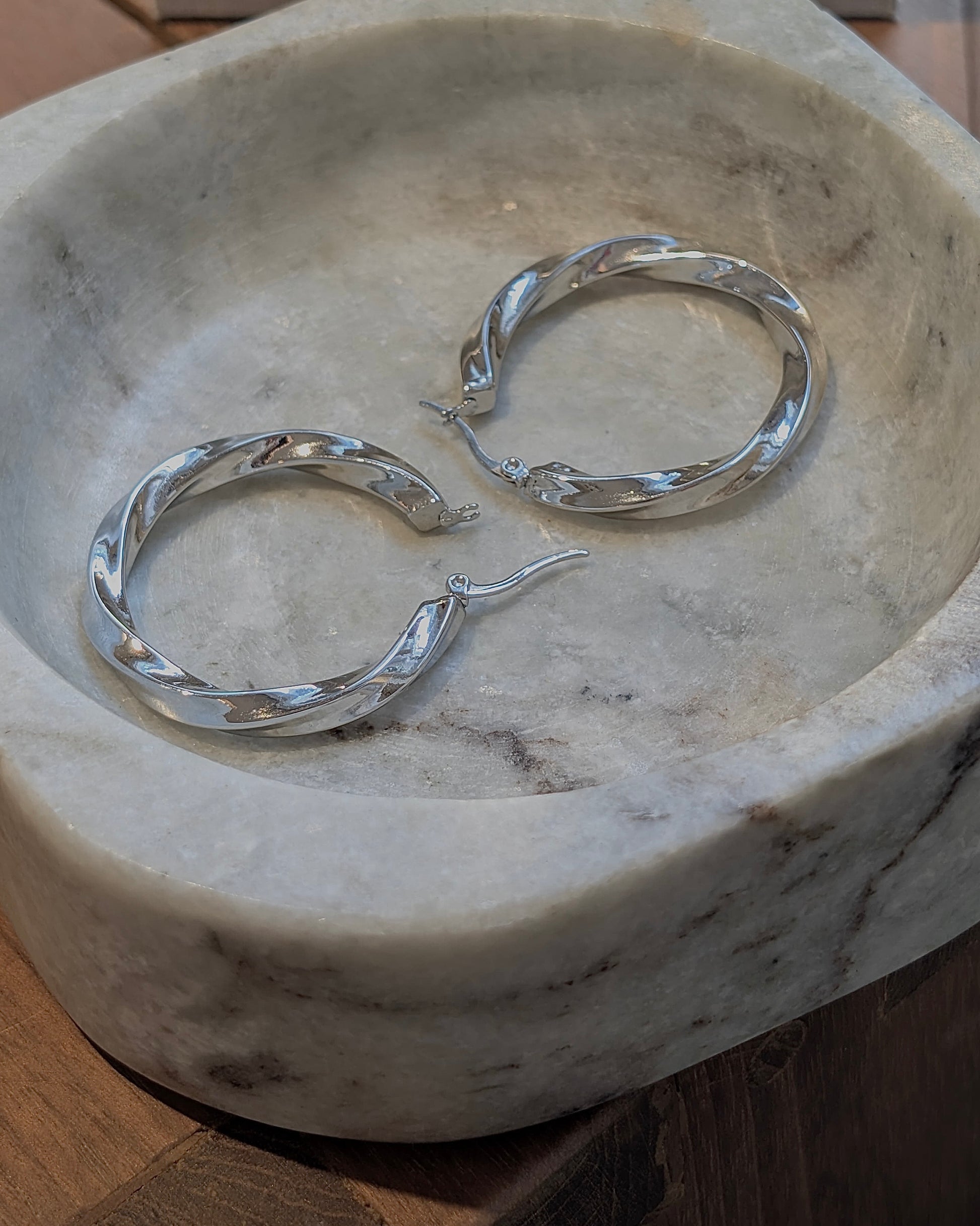 Twisted statement hoop earrings