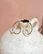 Interlock pearl earrings