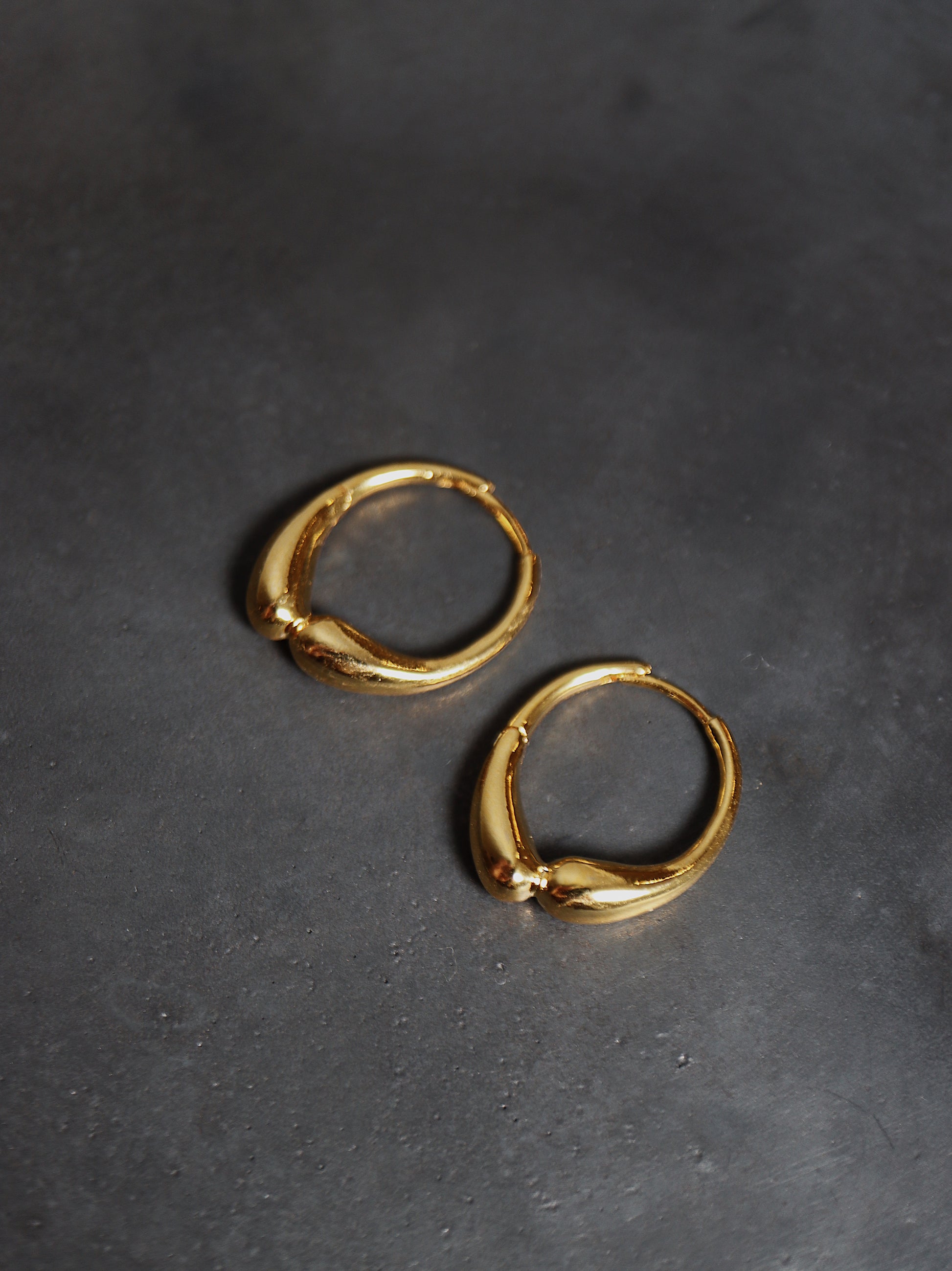 Hinged hoop base metal earrings