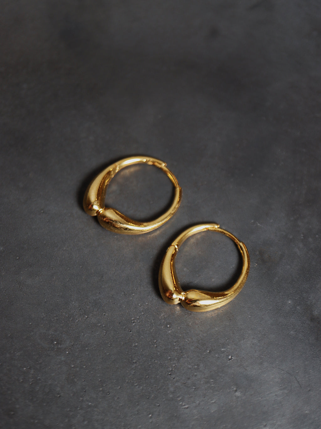 Hinged hoop base metal earrings