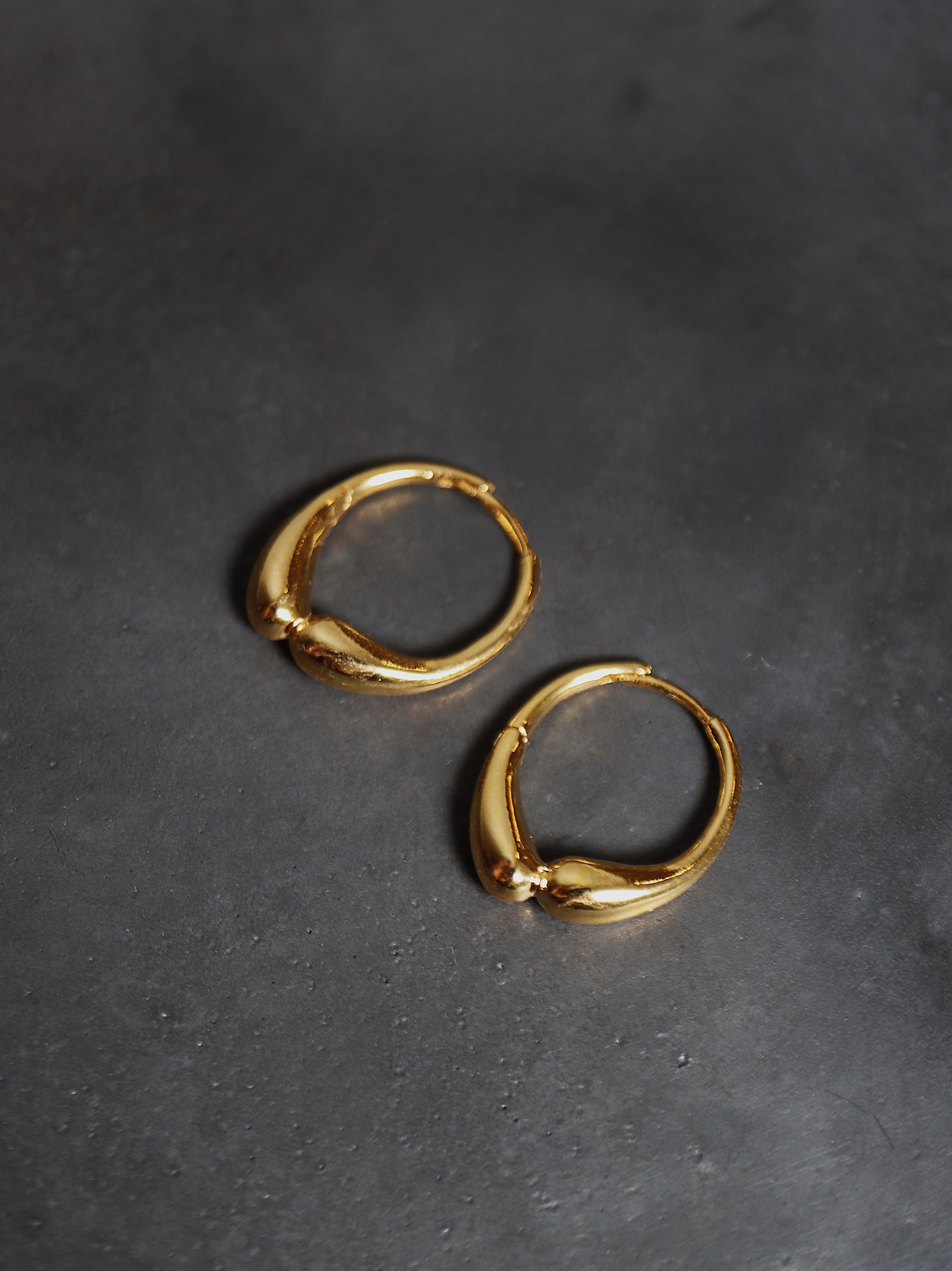 Hinged hoop base metal earrings