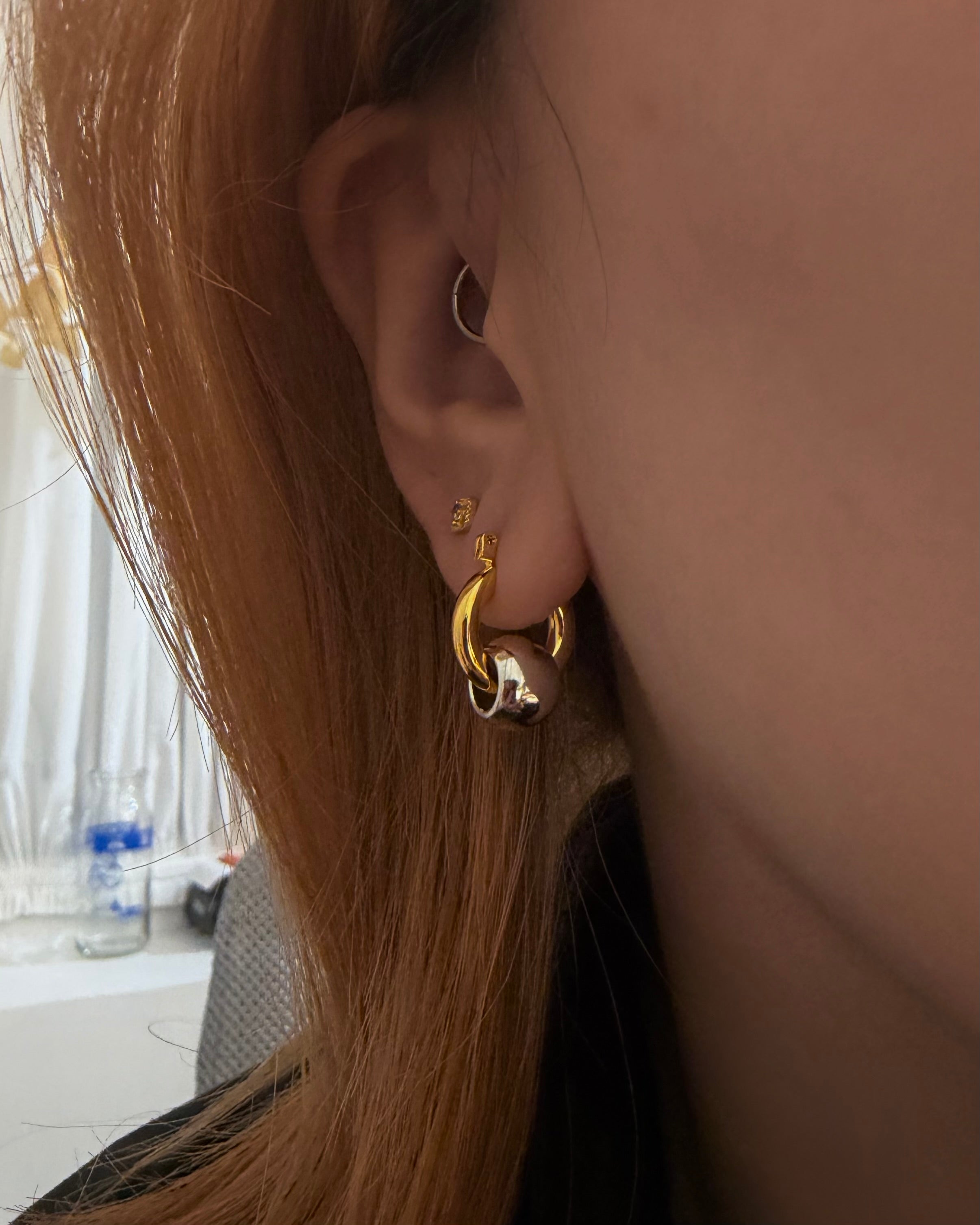 Brass hoop interlock earrings