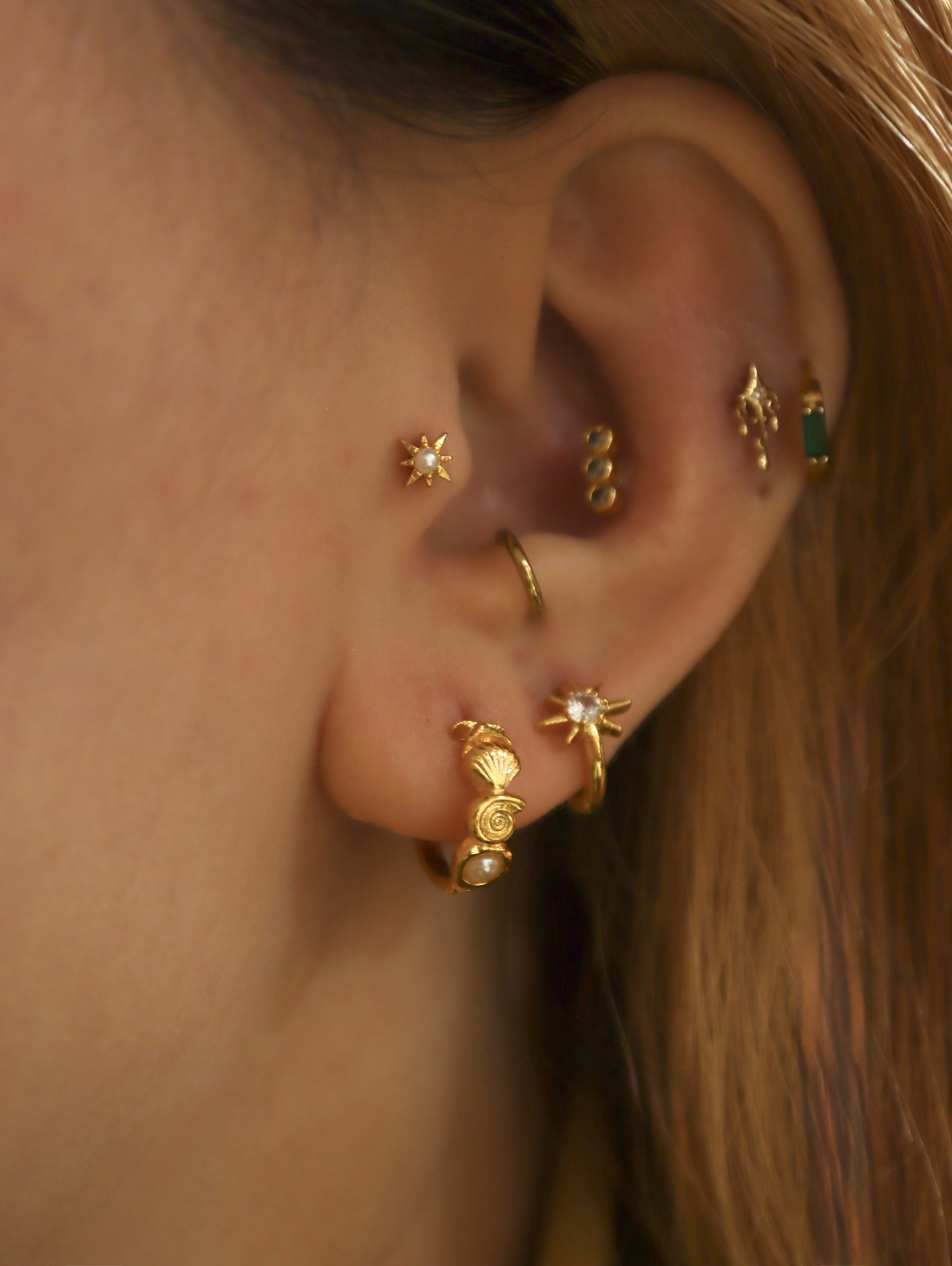 Solaris Star Hinged Hoop Earrings