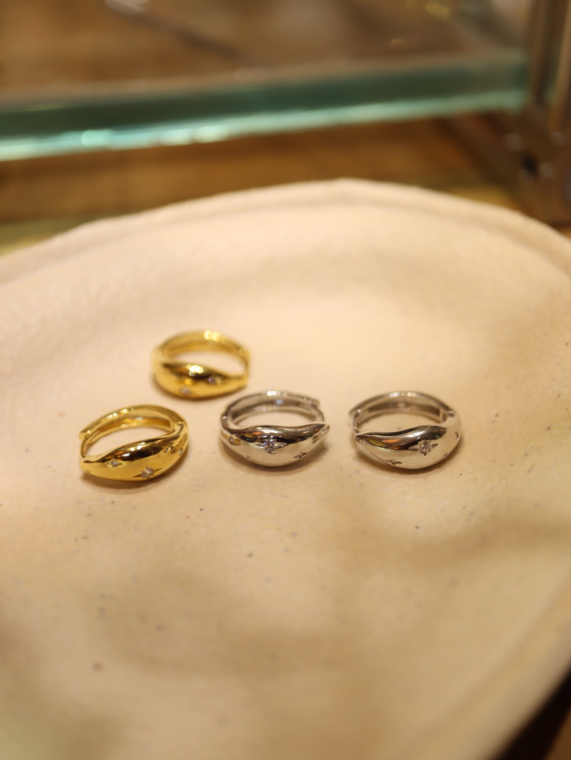 Sparkling cz hinged hoop earrings