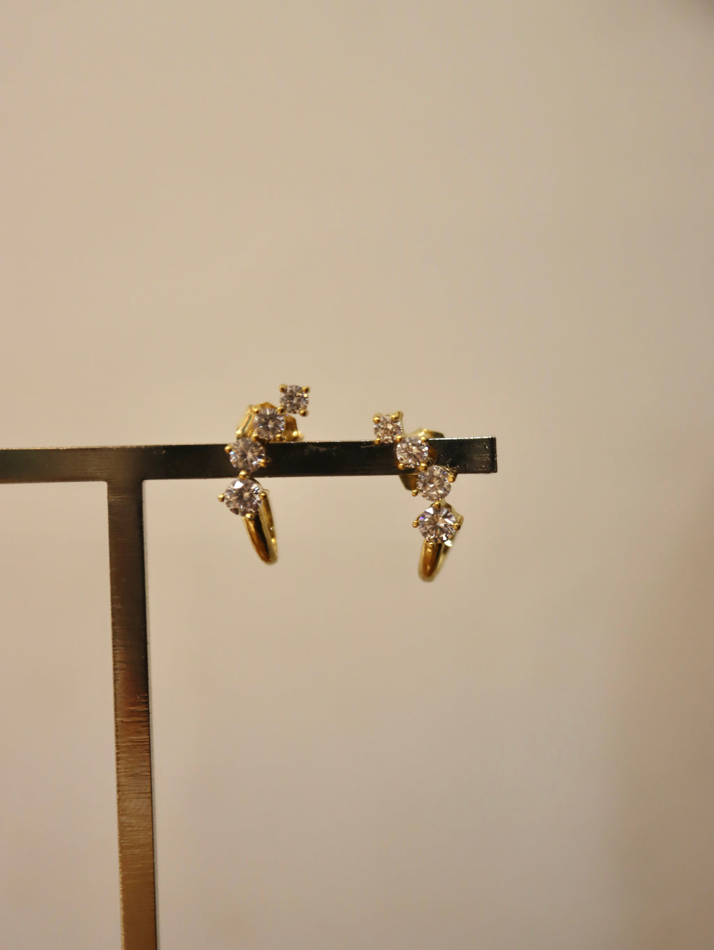 Curved cz brass earrings