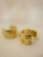 Star cz huggie hoop earrings