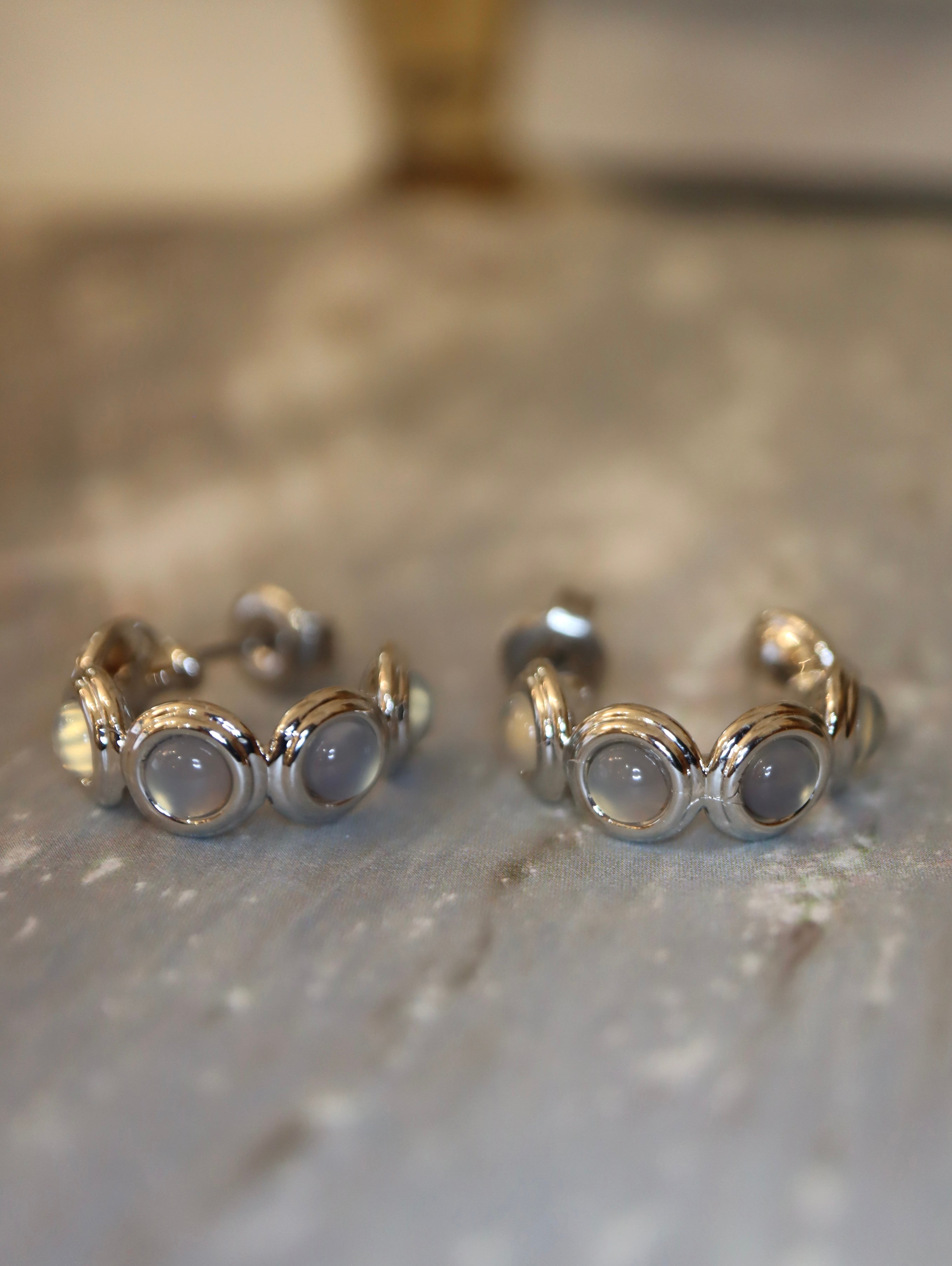 Round stone brass earrings