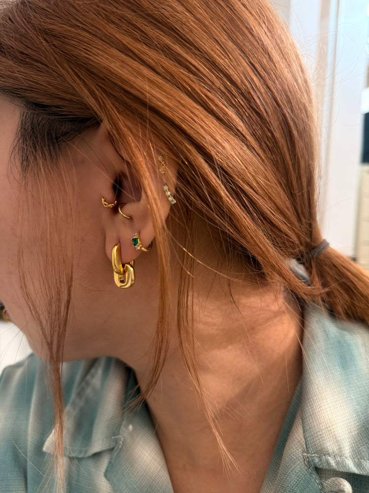 Interlock brass earrings