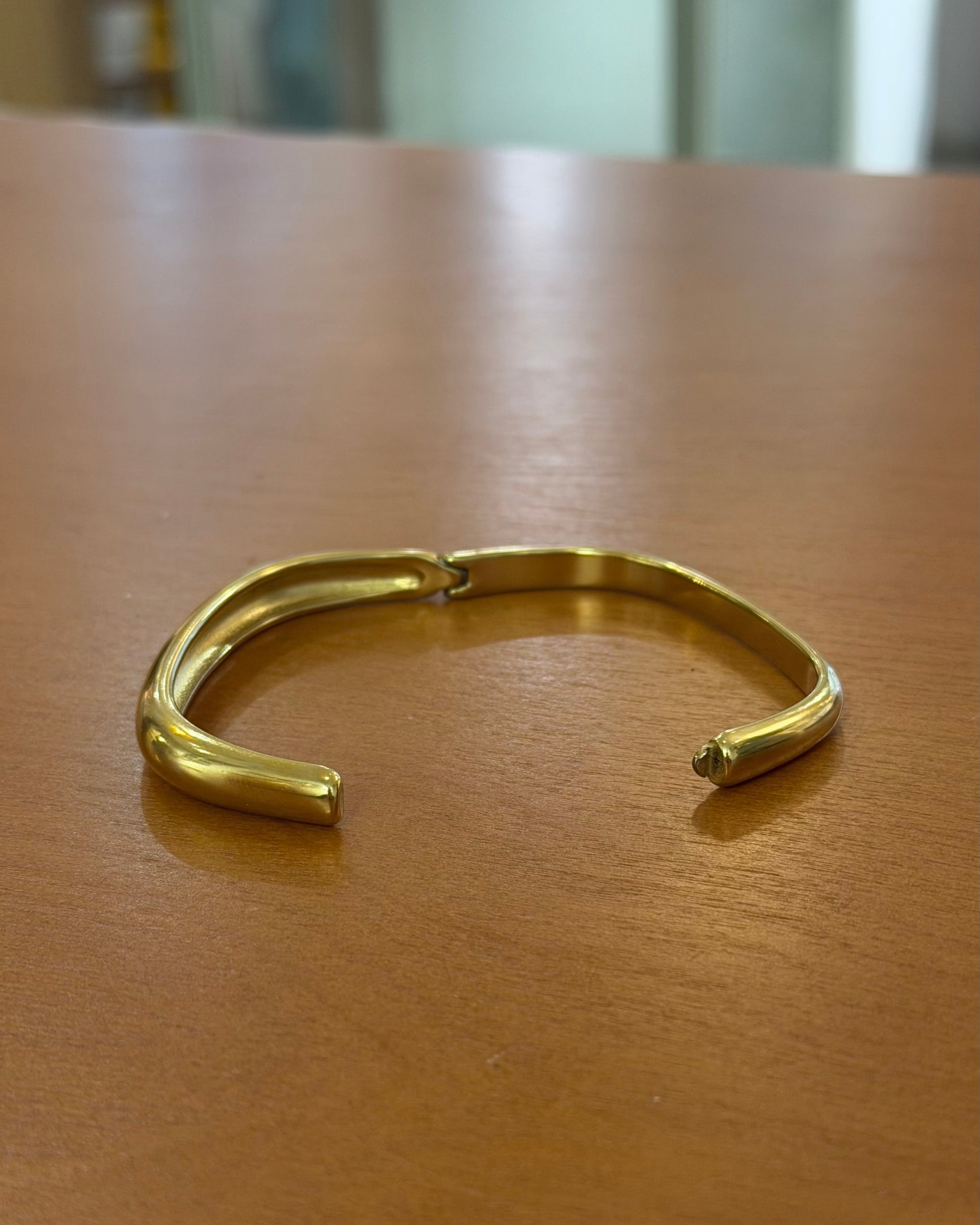 Stainless steel water resistant  lock bangle in gold