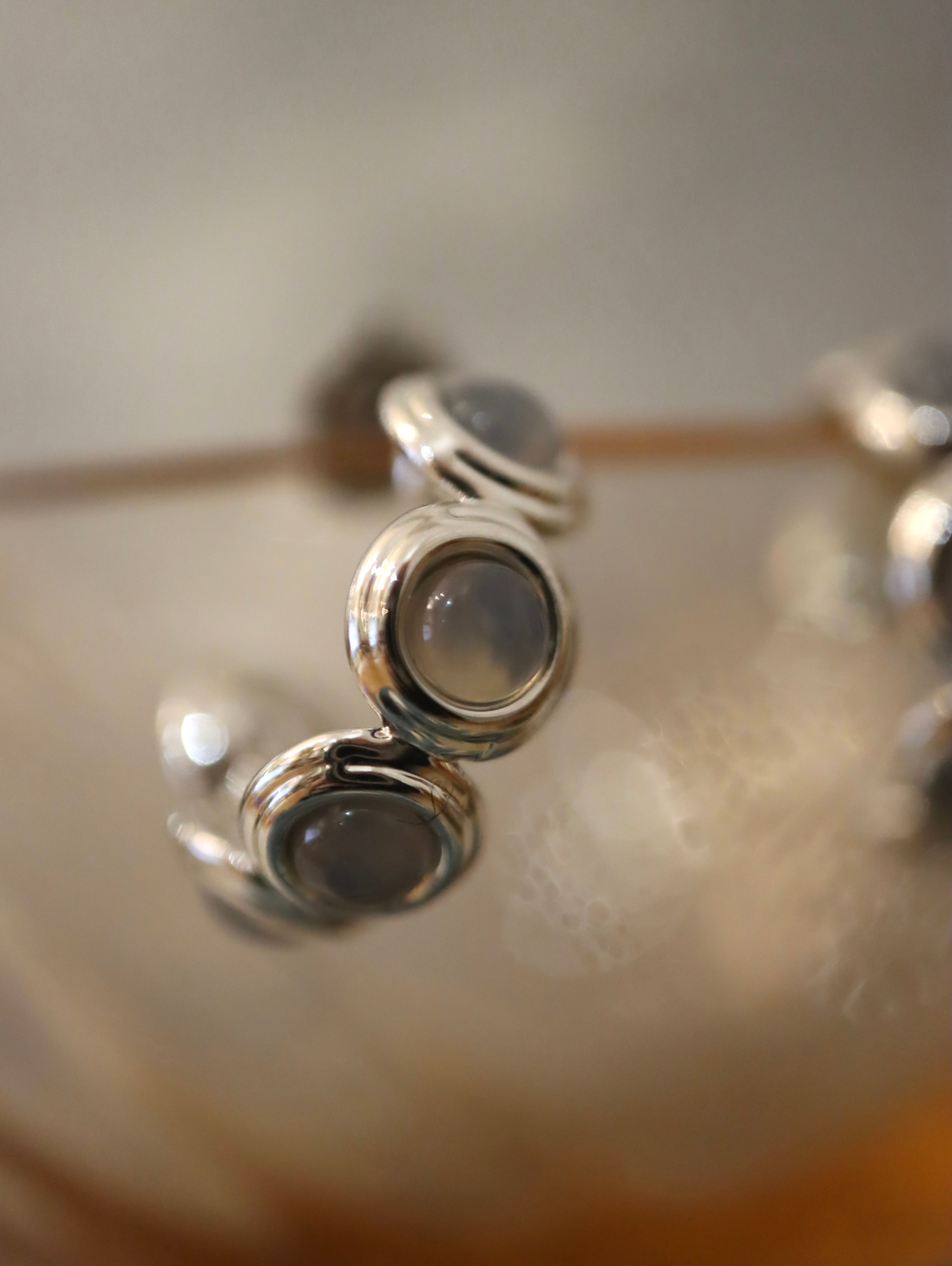 Round stone brass earrings