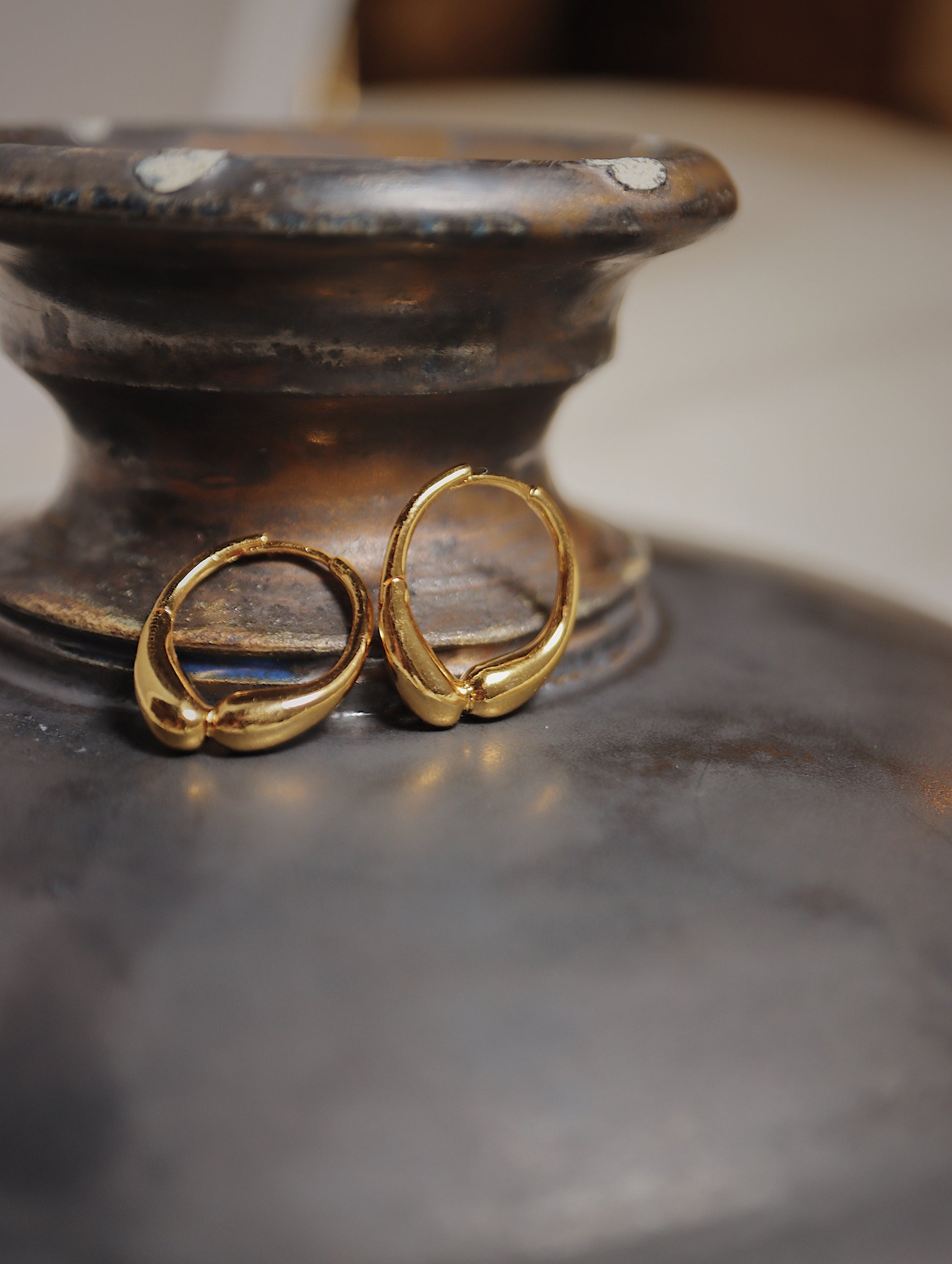 Hinged hoop base metal earrings
