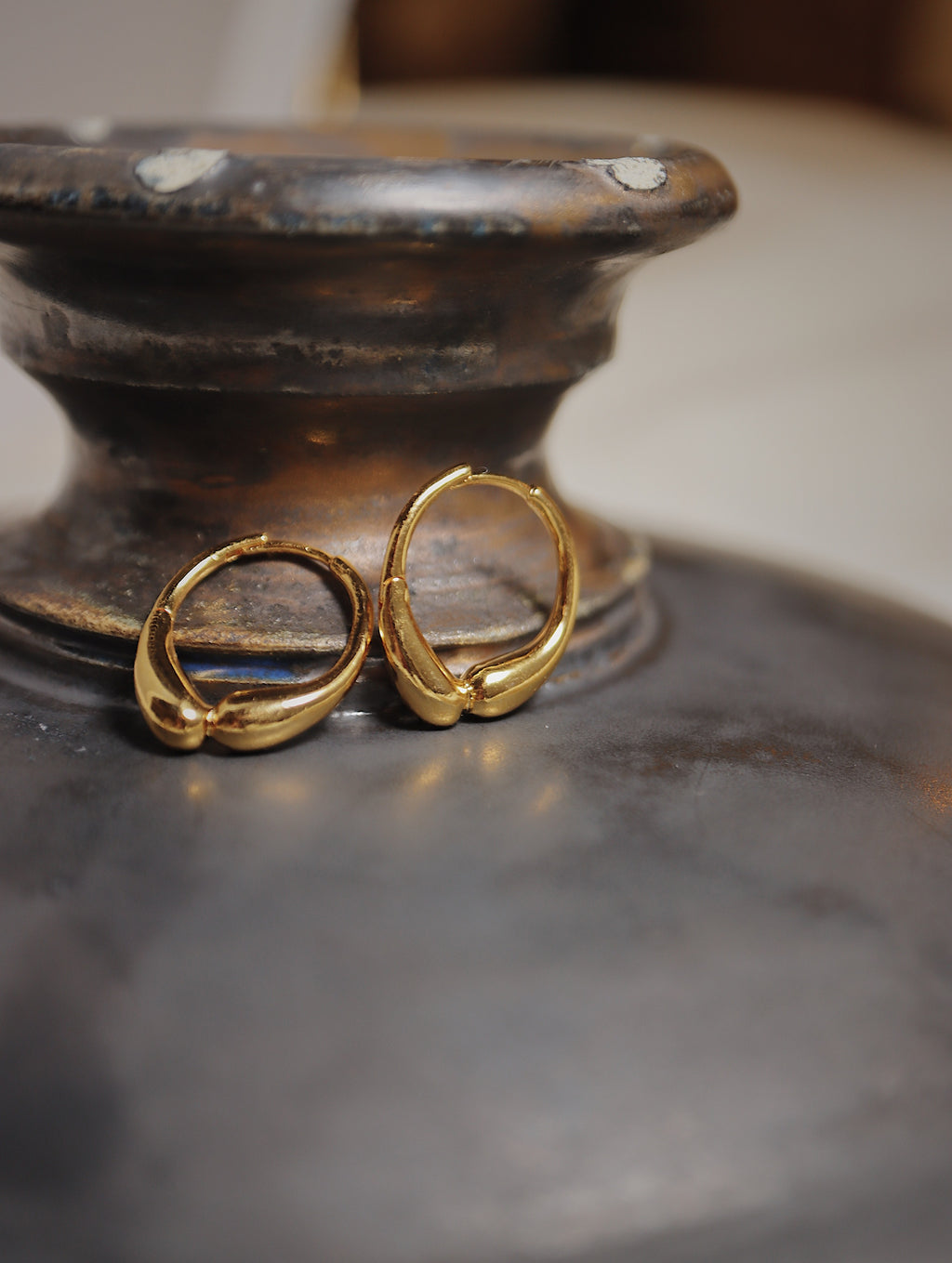 Hinged hoop base metal earrings