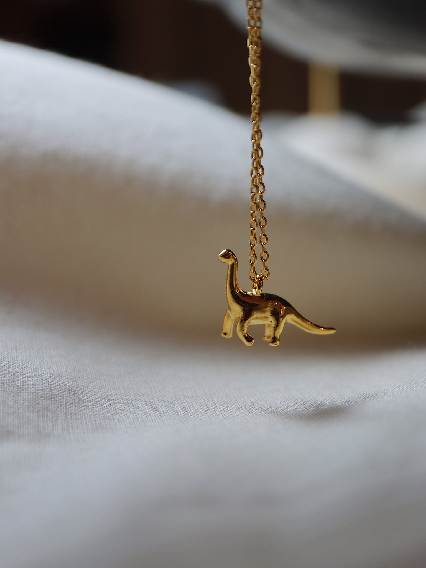 Dinosaur brass necklace