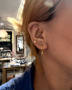 Hinged hoop drop starburst earrings
