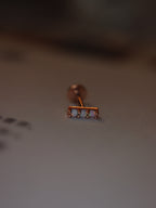 Triple opal flat back piercing