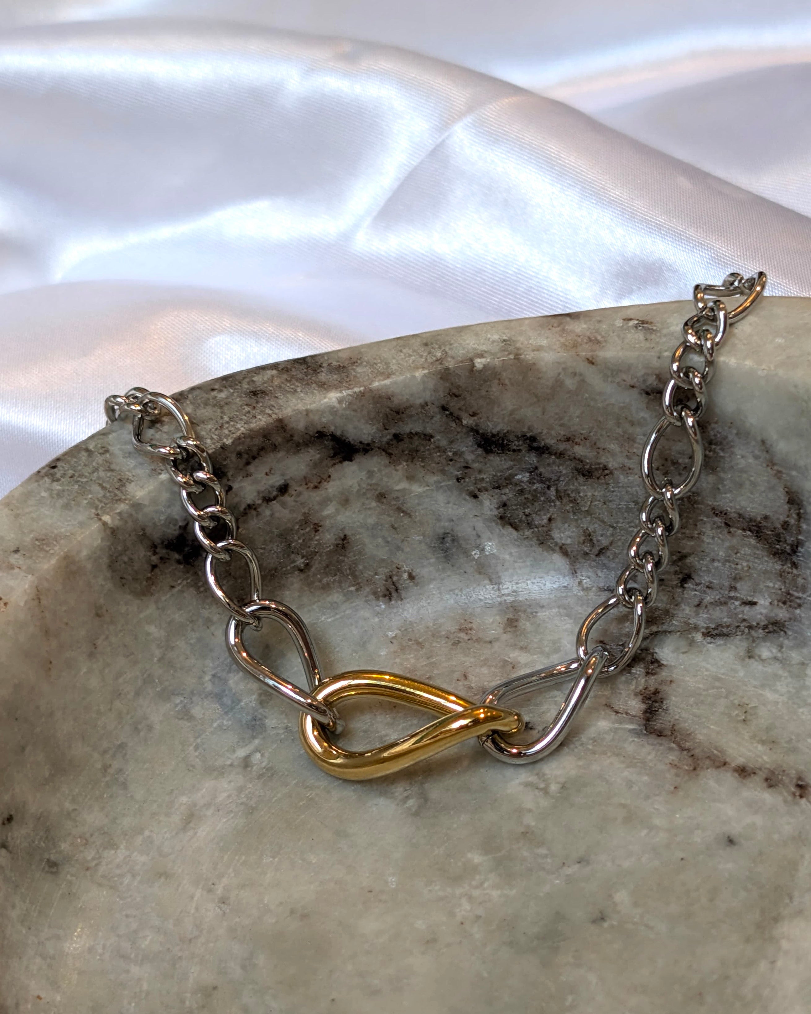 Mix tone interlock stainless steel bracelet