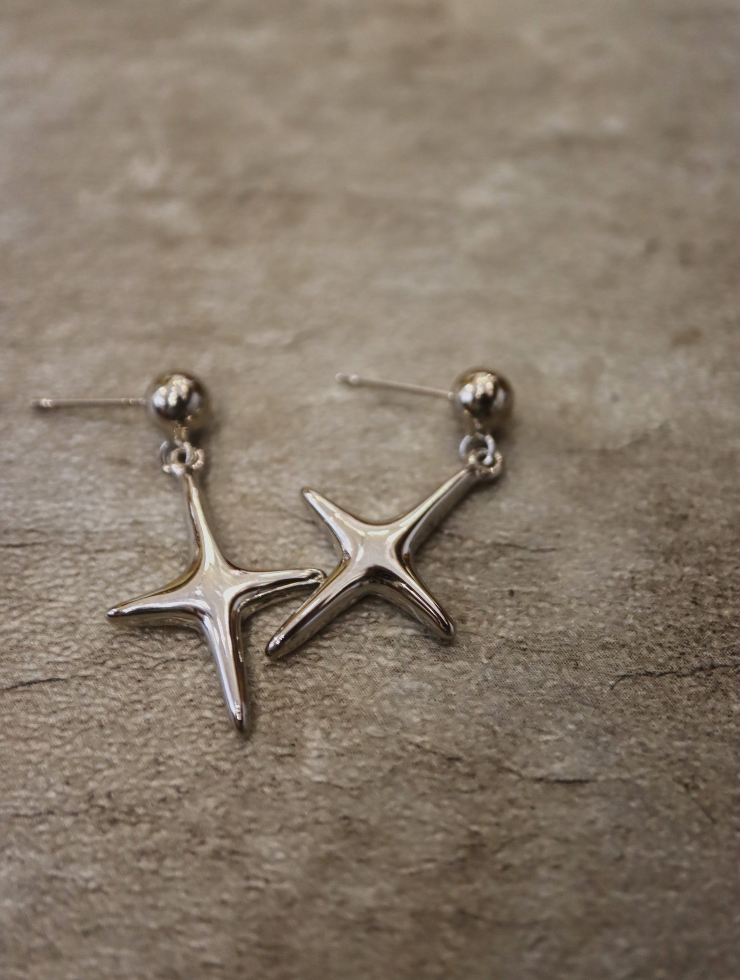 Drop star brass earrings