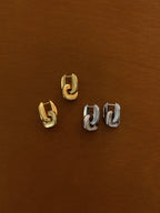 Interlock brass earrings