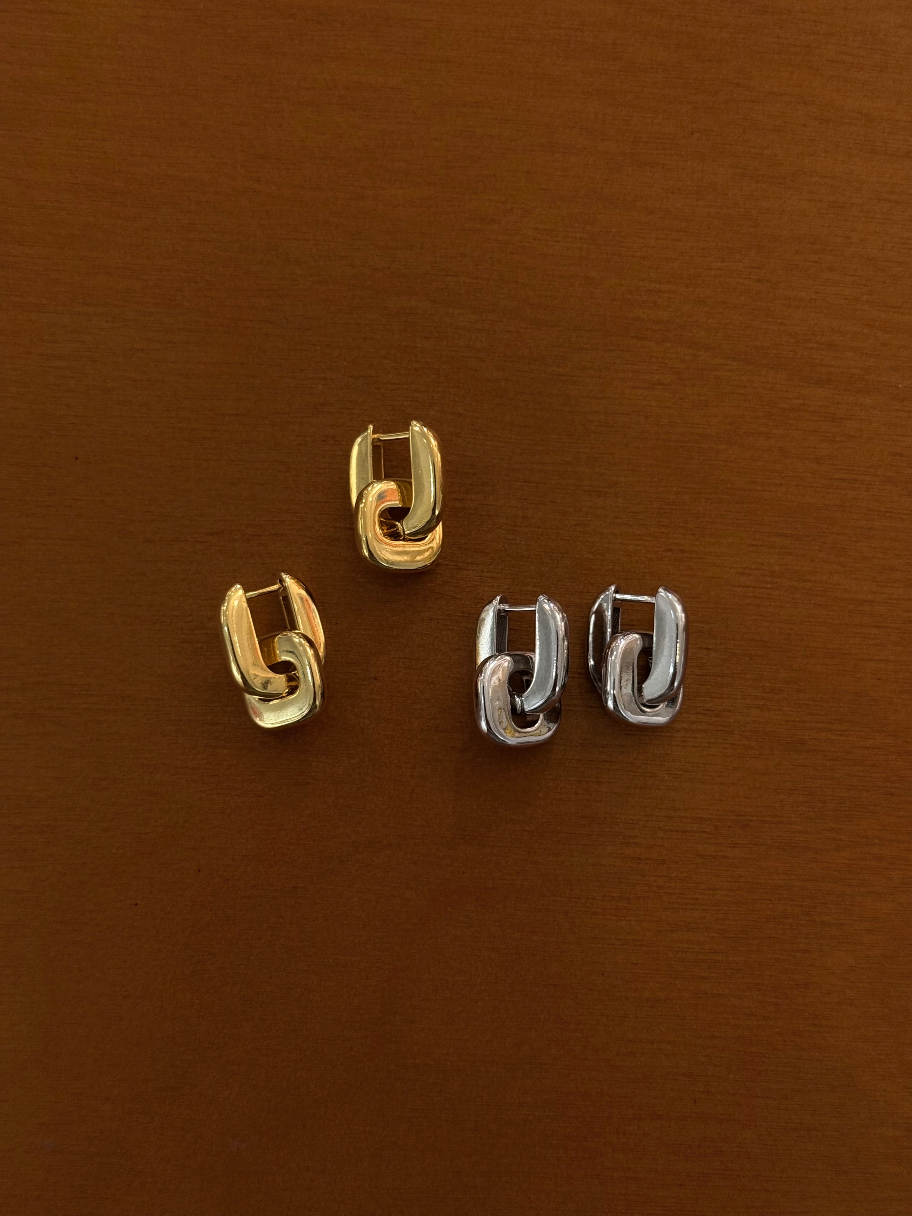 Interlock brass earrings