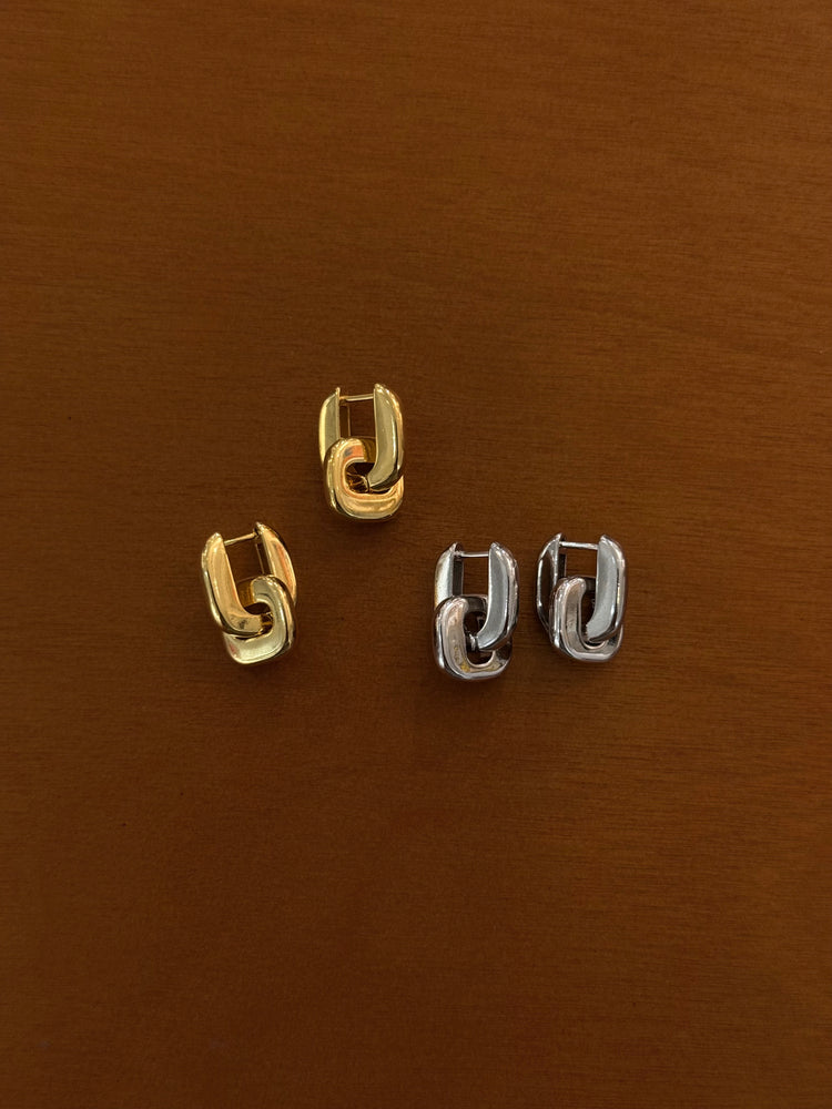 Interlock brass earrings