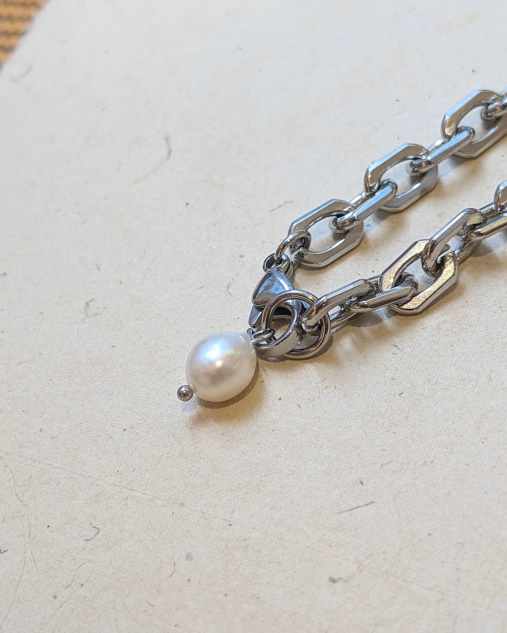 Interlock raw pearl stainless steel bracelet