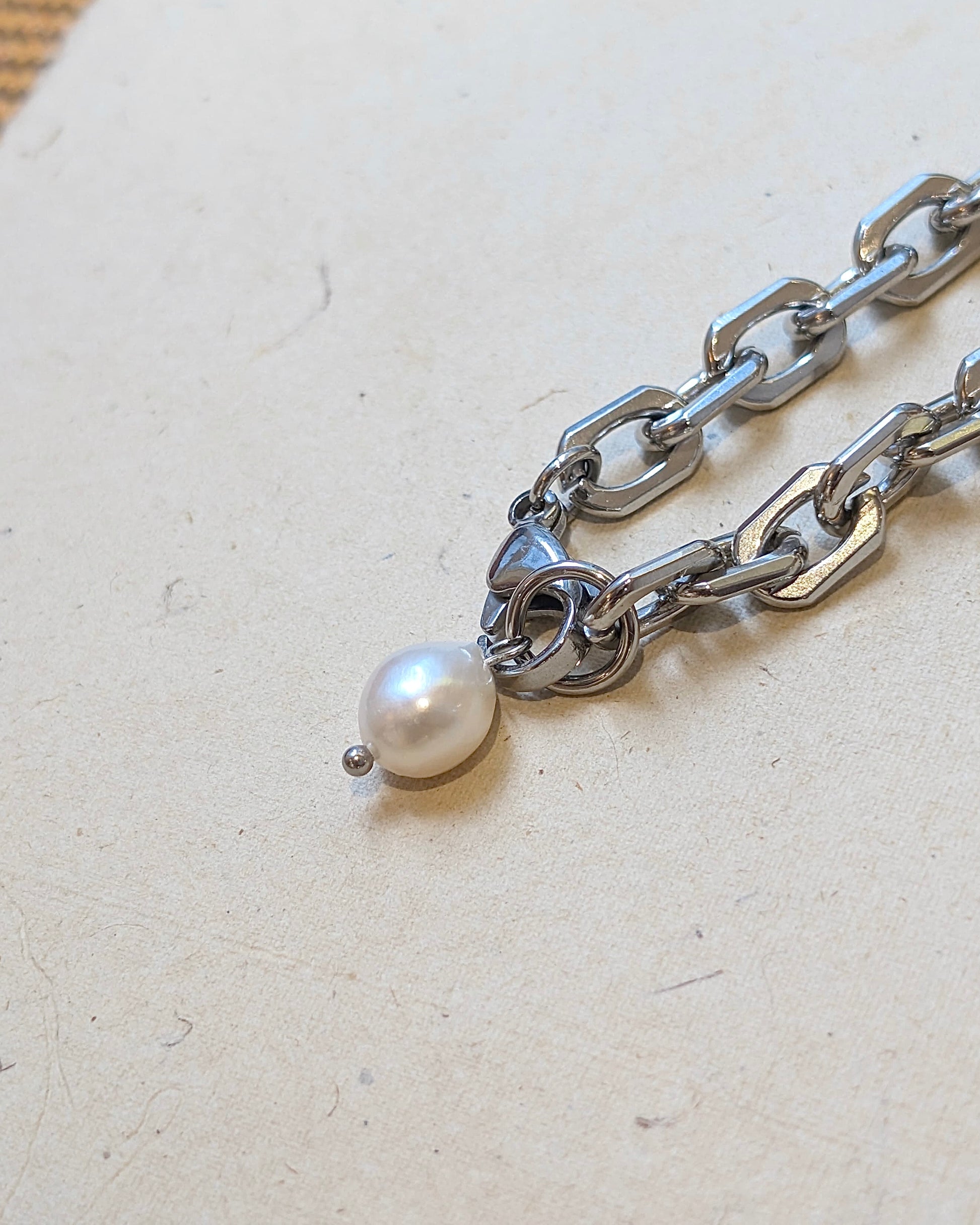 Interlock raw pearl stainless steel bracelet