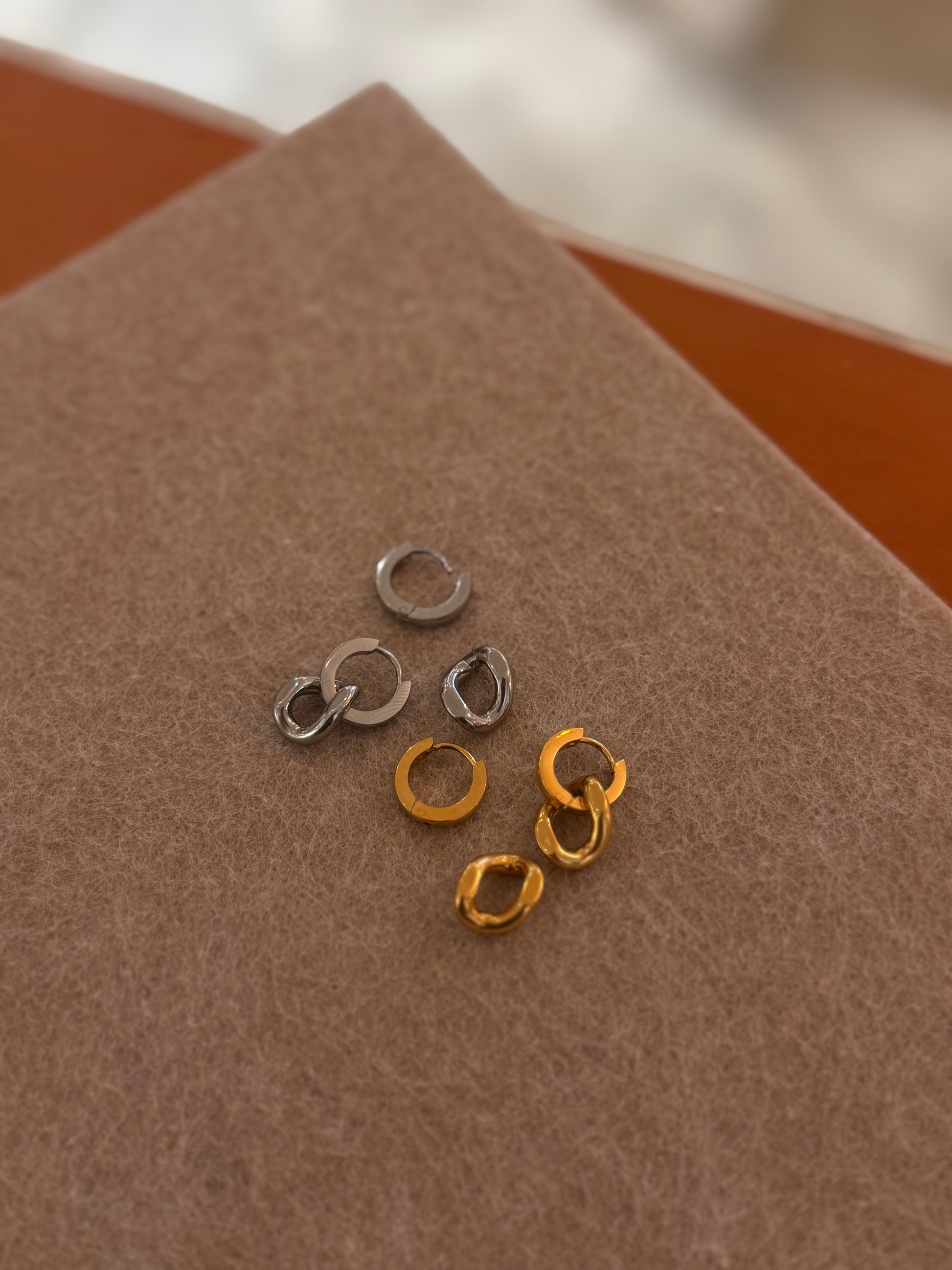Interlock stainless steel earrings