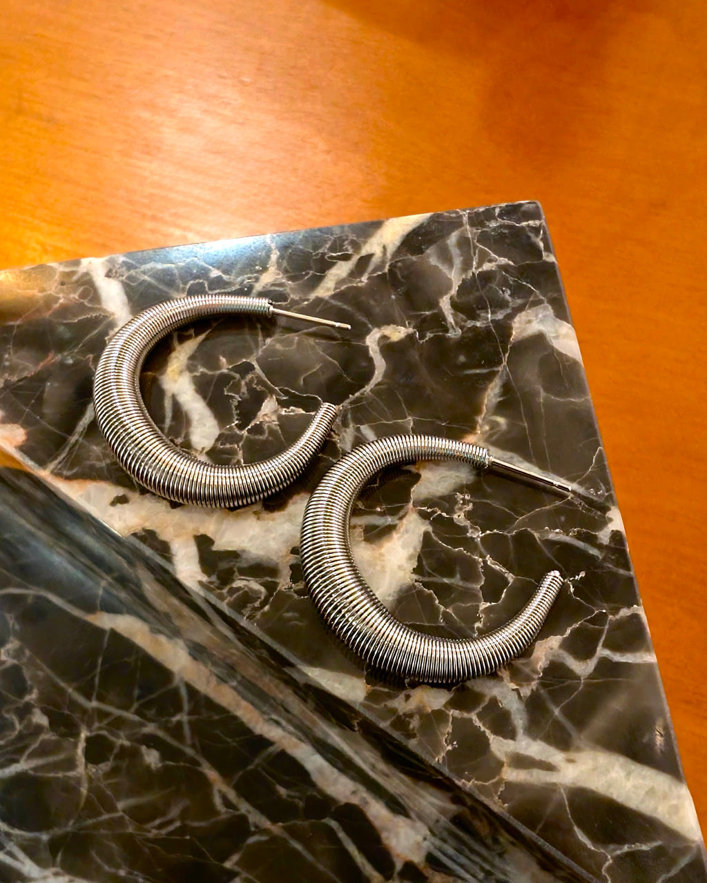 Coil steel hoop earrings