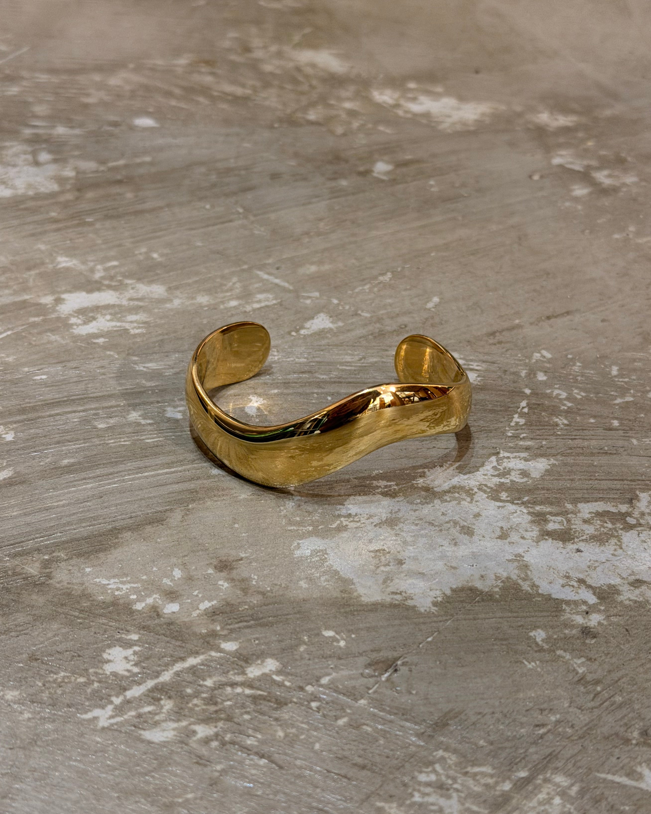 Bold wavy stainless steel bangle