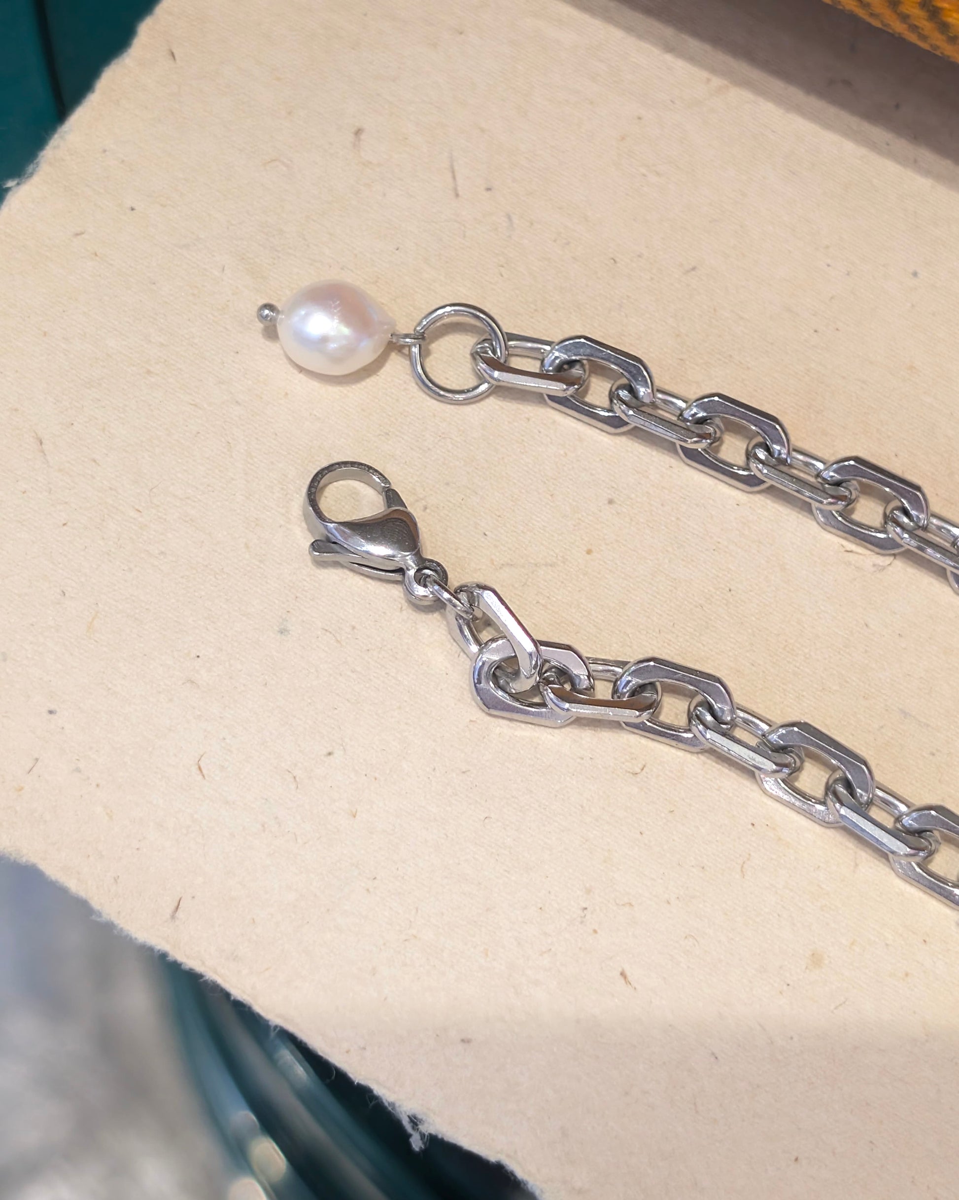 Interlock raw pearl stainless steel bracelet