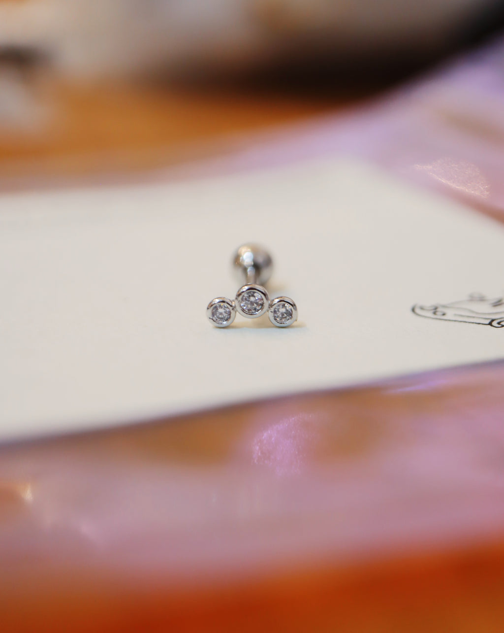 Triple cz surgical steel stud earring