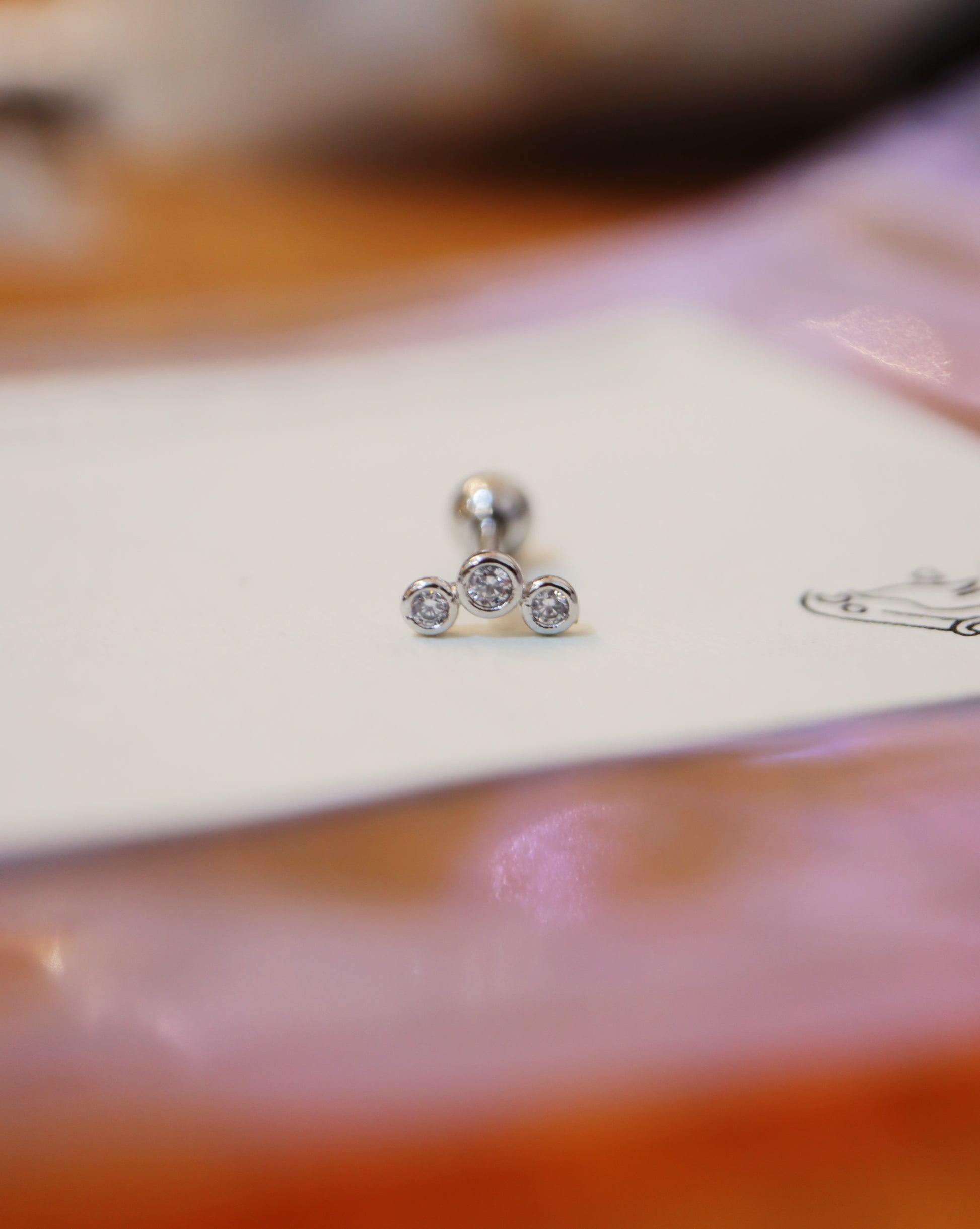 Triple cz surgical steel stud earring