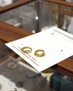 Sparkling cz twisted brass earrings
