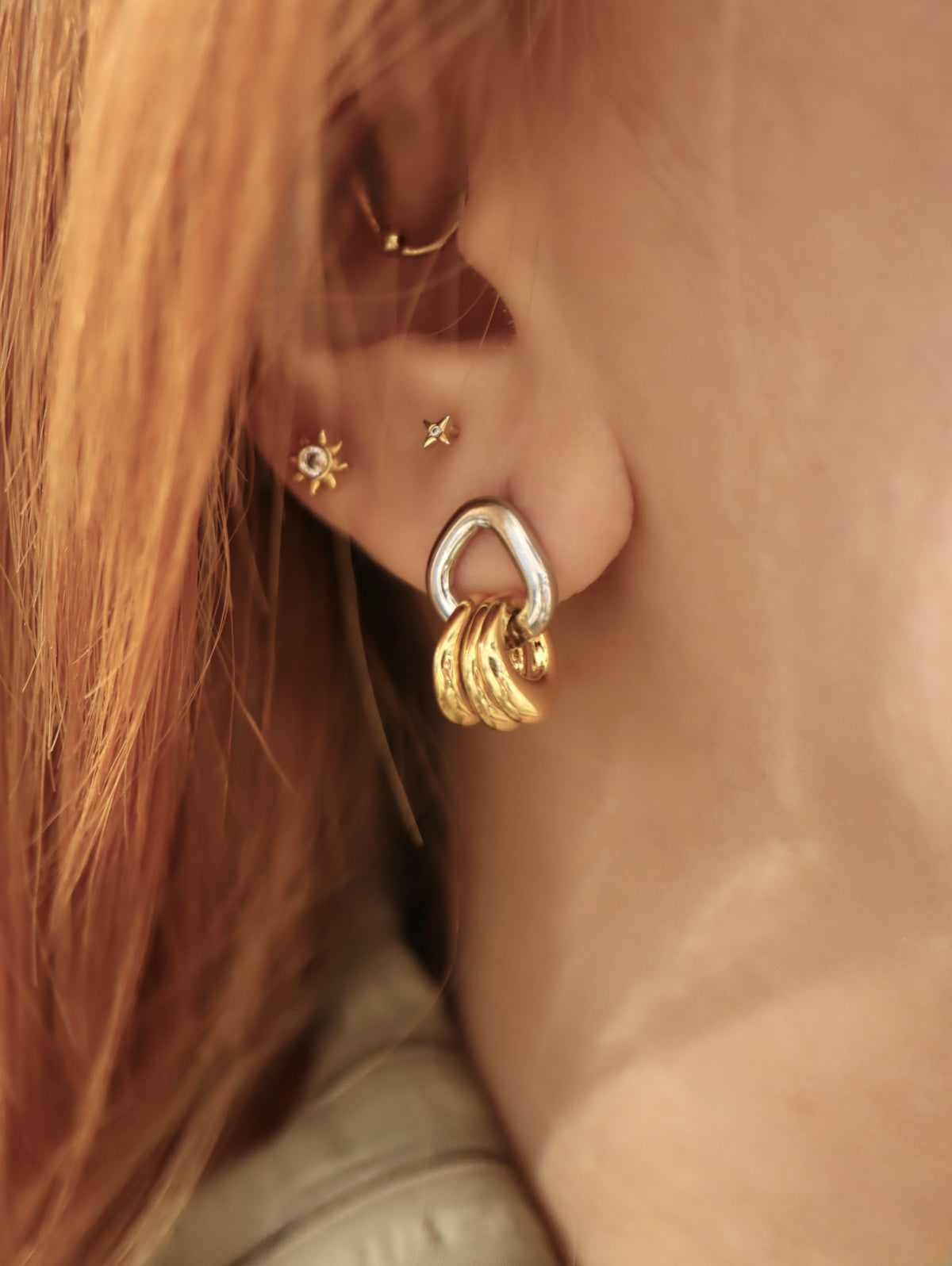 Mix tone interlock earrings