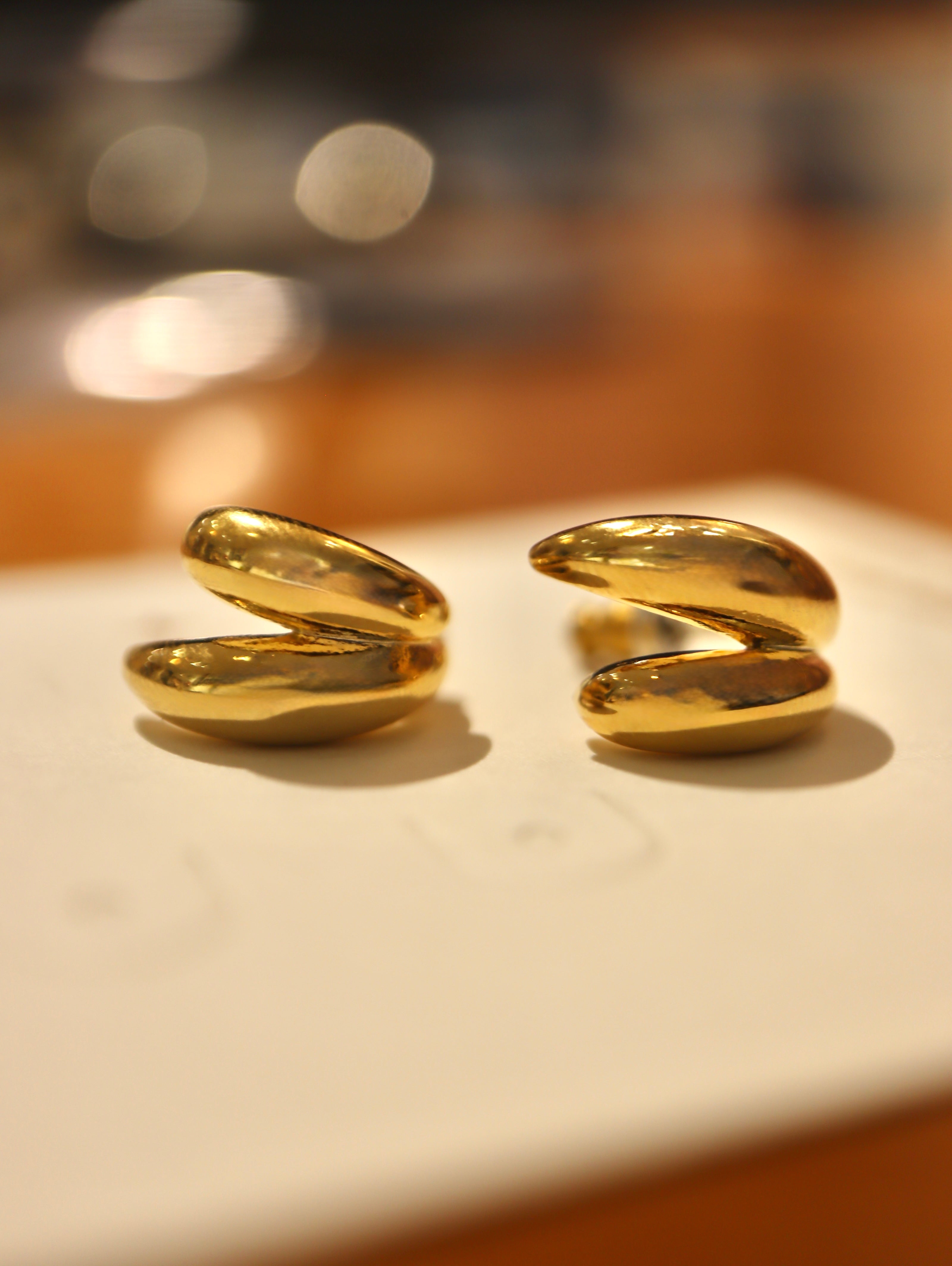 Echo brass earrings