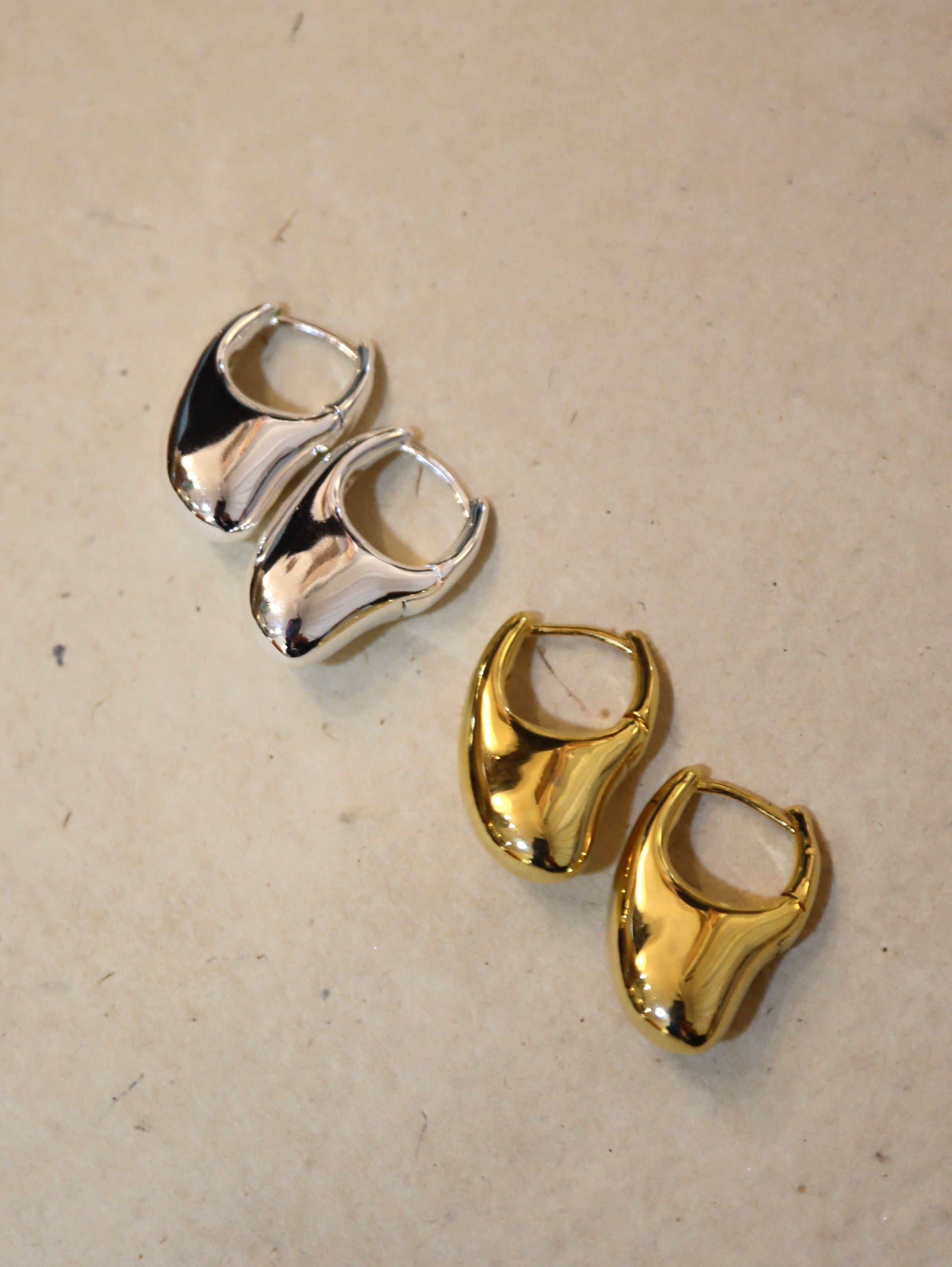 Irregular hoop brass earrings