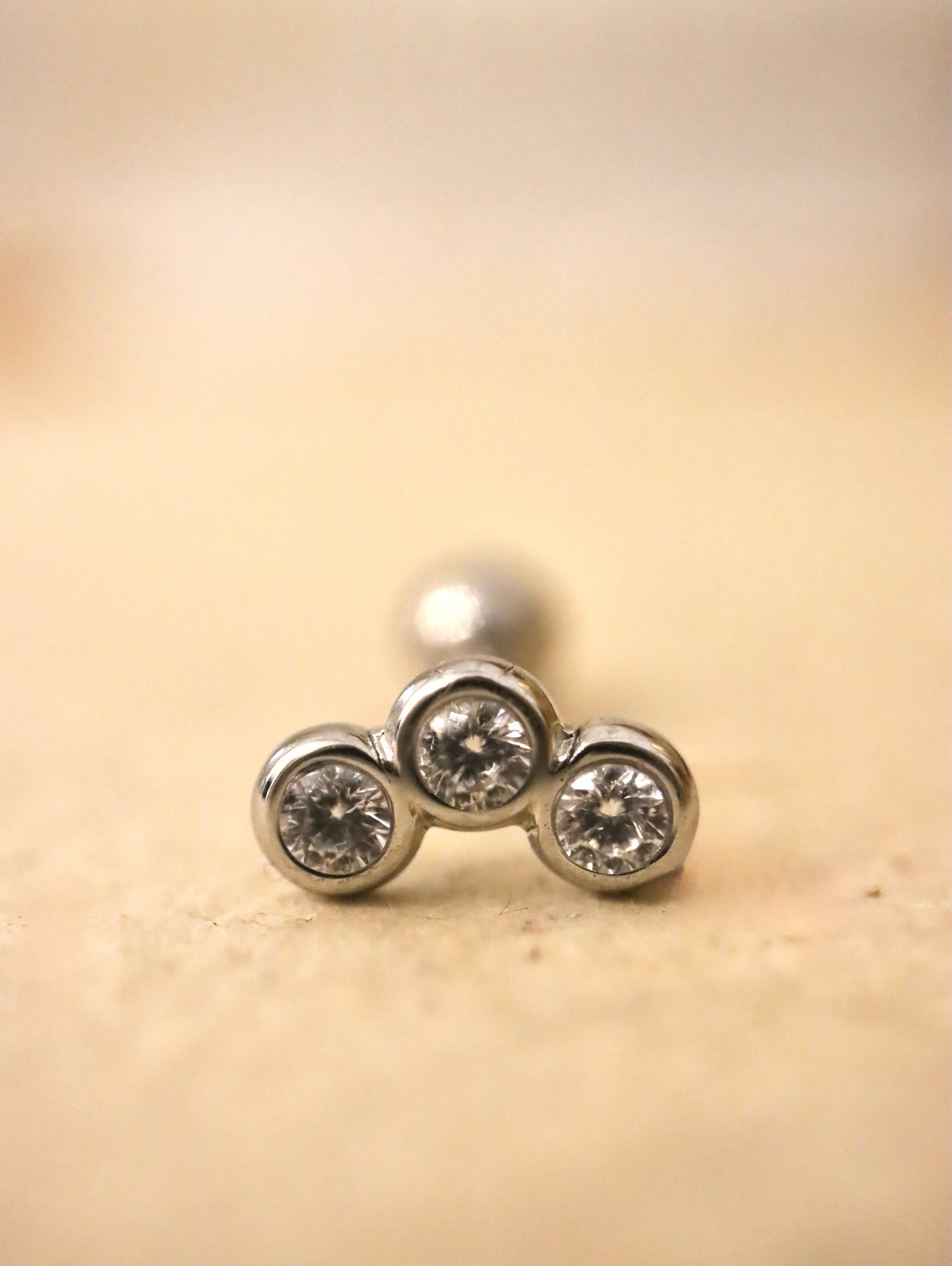 Triple cz surgical steel stud piercing