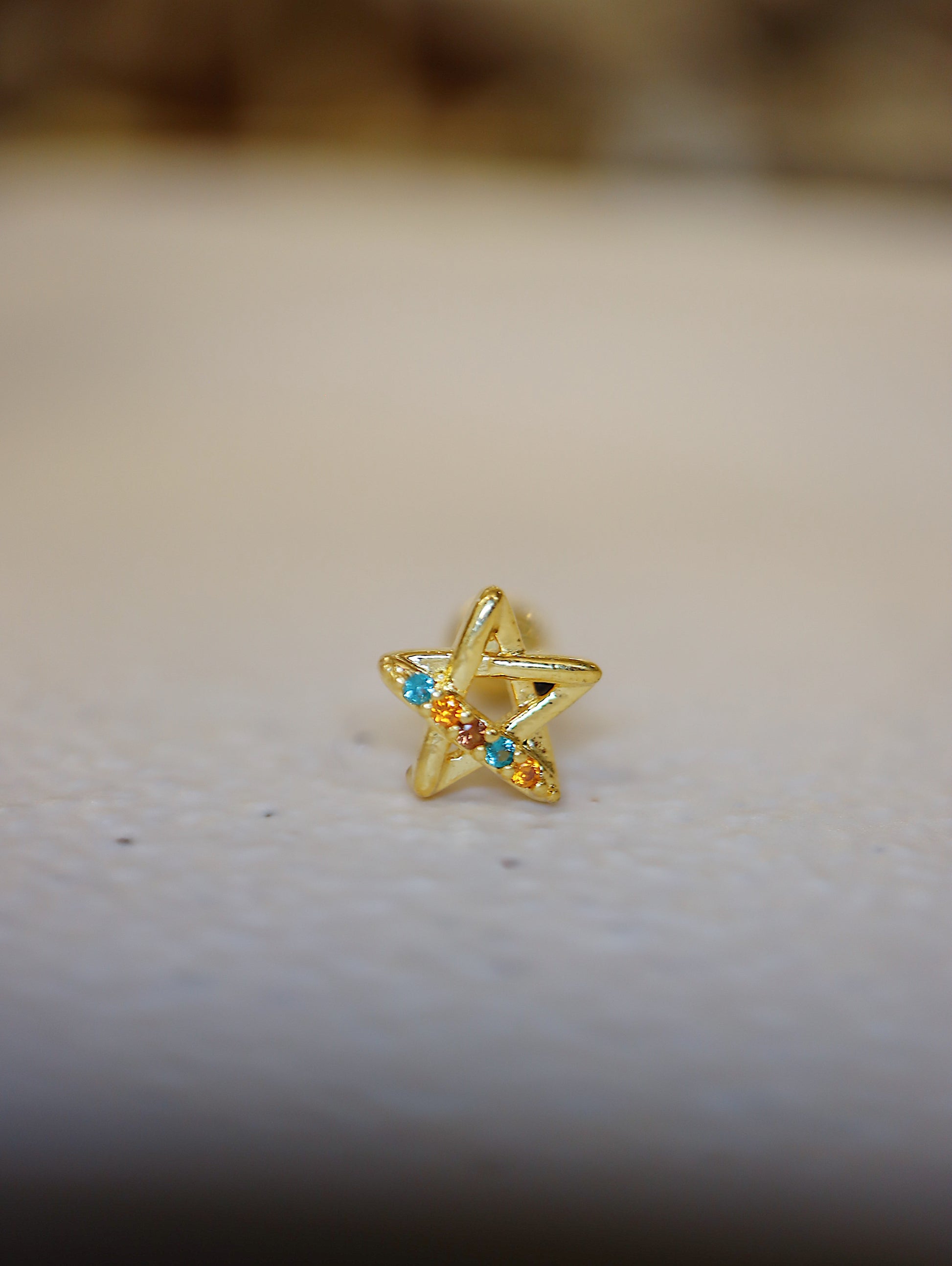 Rainbow star surgical steel stud piercing
