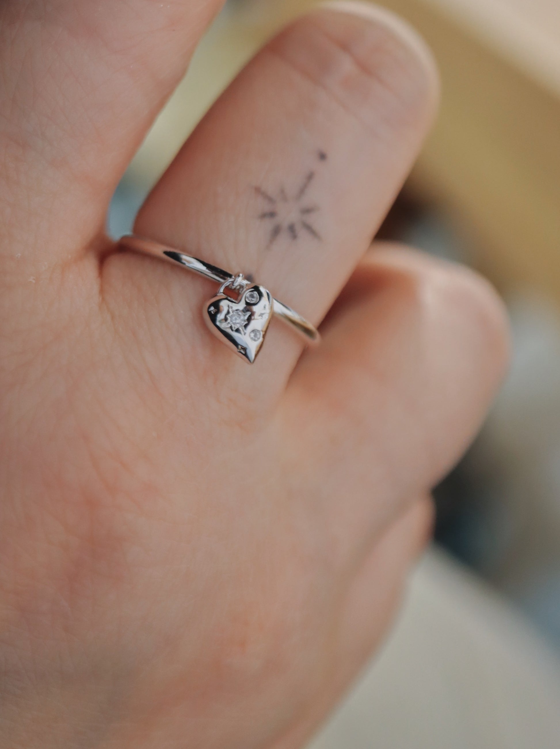 Drop cz heart open size ring