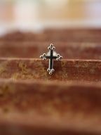 Cross surgical steel piering stud