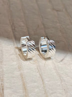 Surgical steel flat hinged hoop earrings