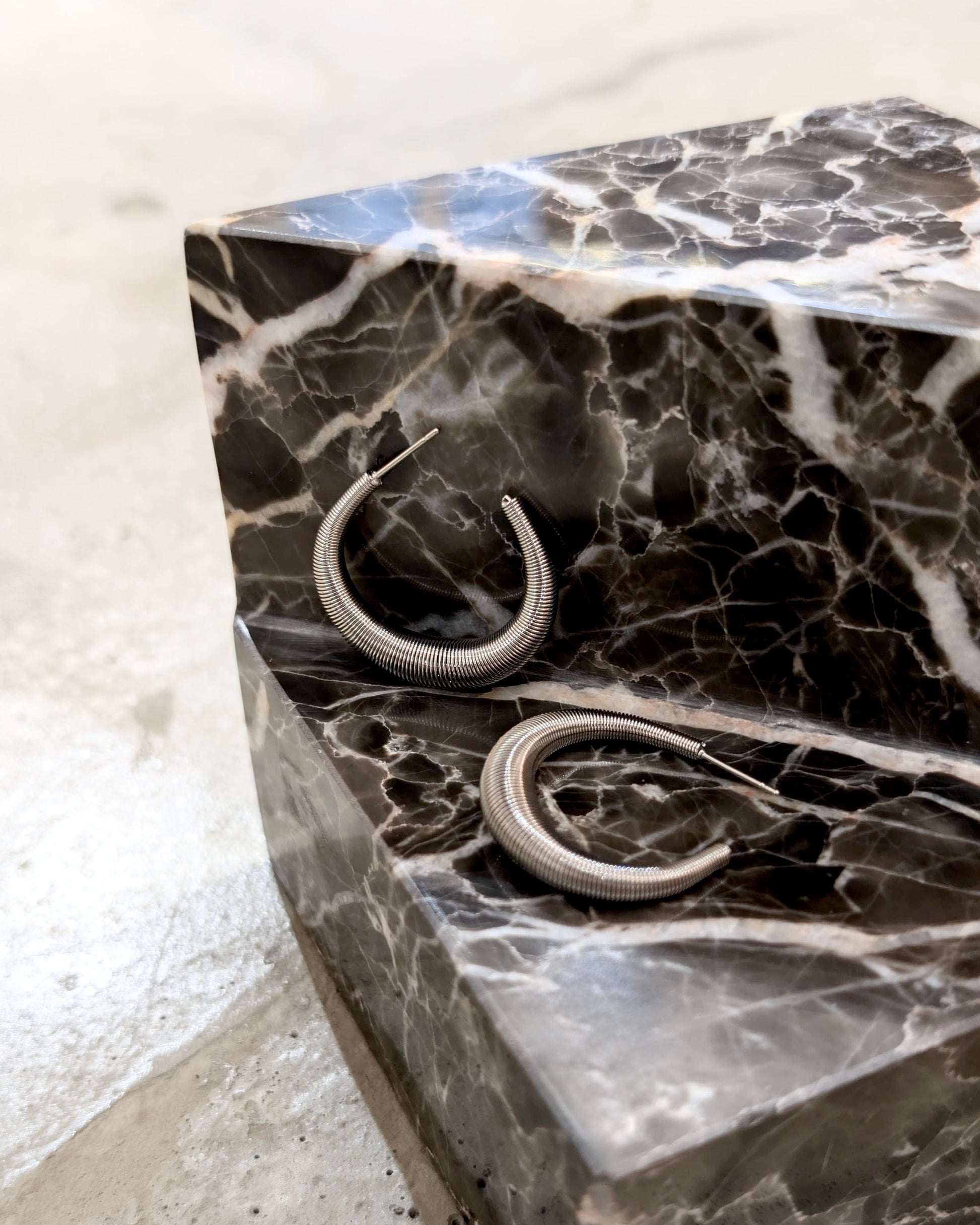 Coil steel hoop earrings