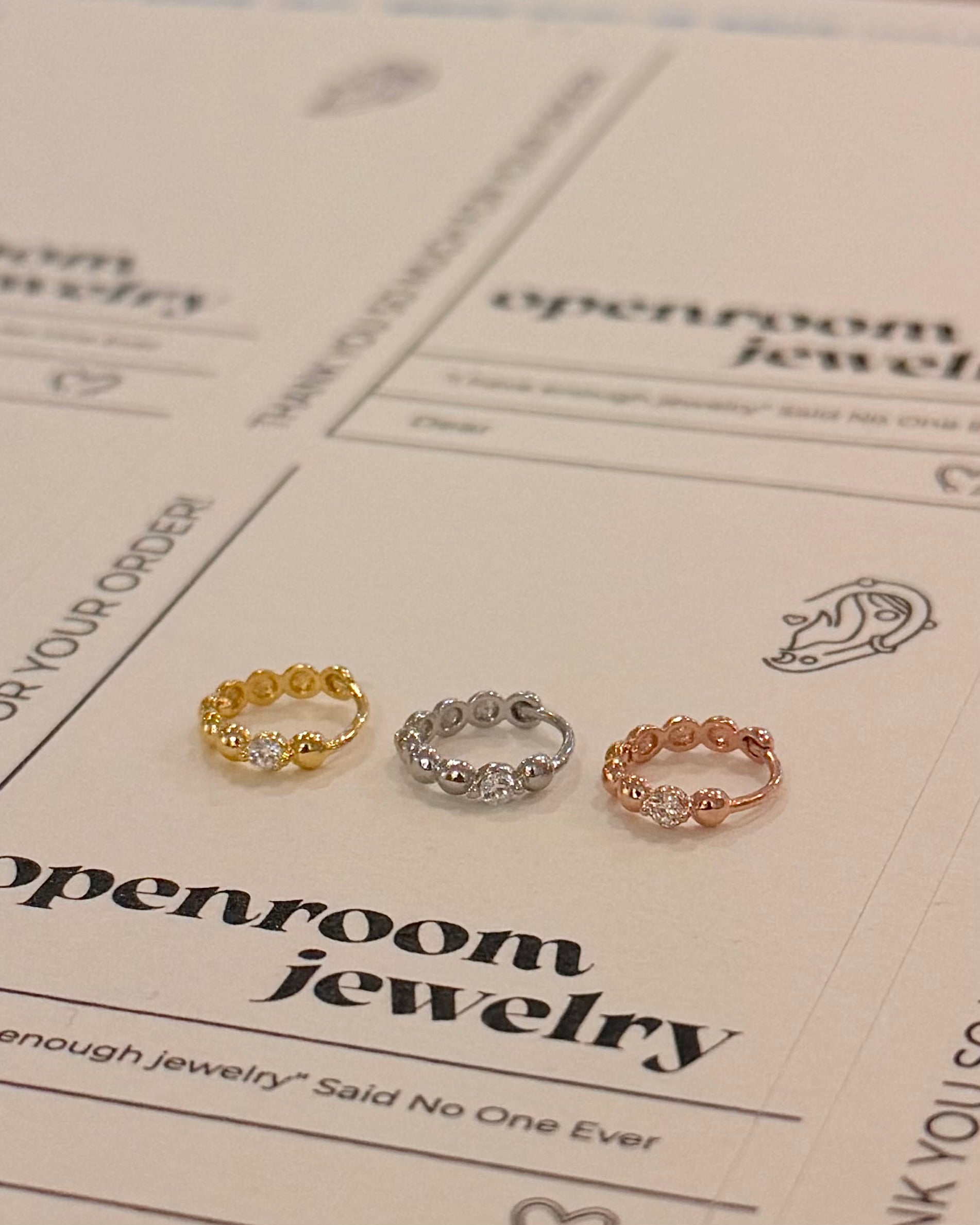 Cz hinged hoop earring piercing