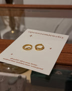 Sparkling cz twisted brass earrings