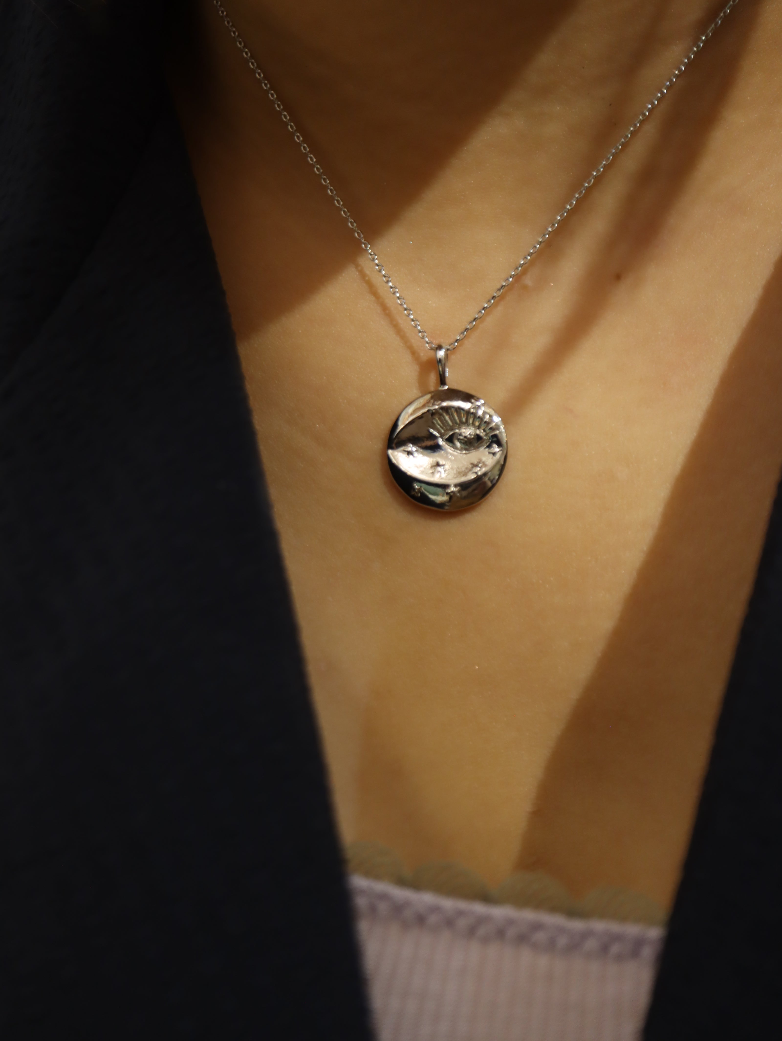 Eye coin brass necklace